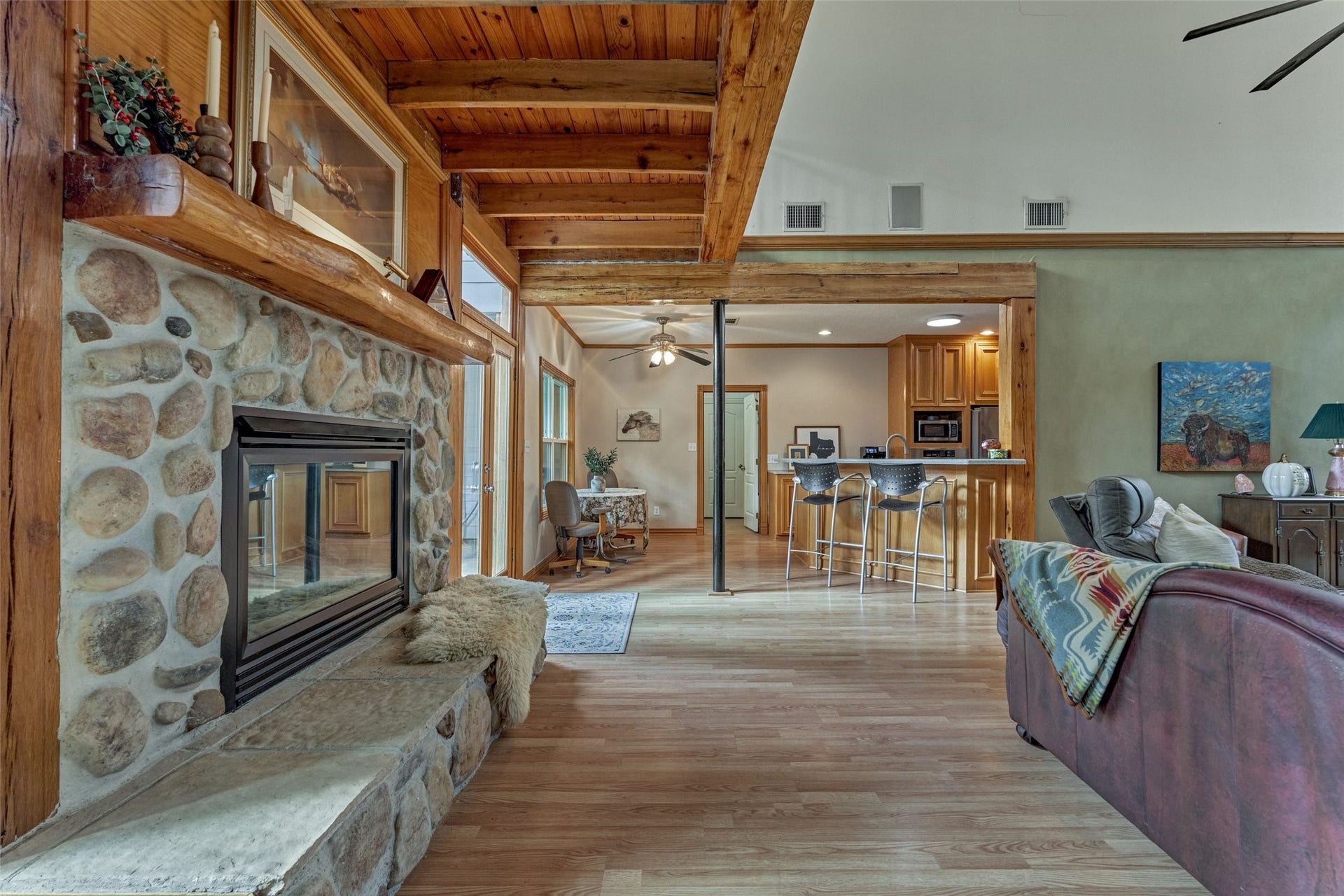 28911 Sapphire Circle, Magnolia, TX 77355 Rustic stone fireplace and custom hand hewn logs from owners original property