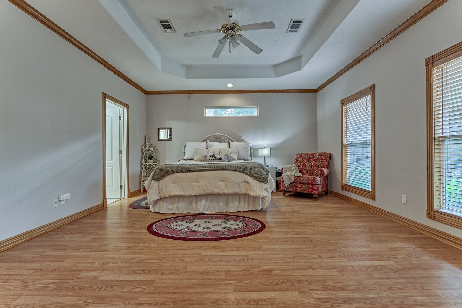 28911 Sapphire Circle, Magnolia, TX 77355 Owner's suite is separate from other bedrooms, making it a private retreat just off the main living area and overlooking the back property.