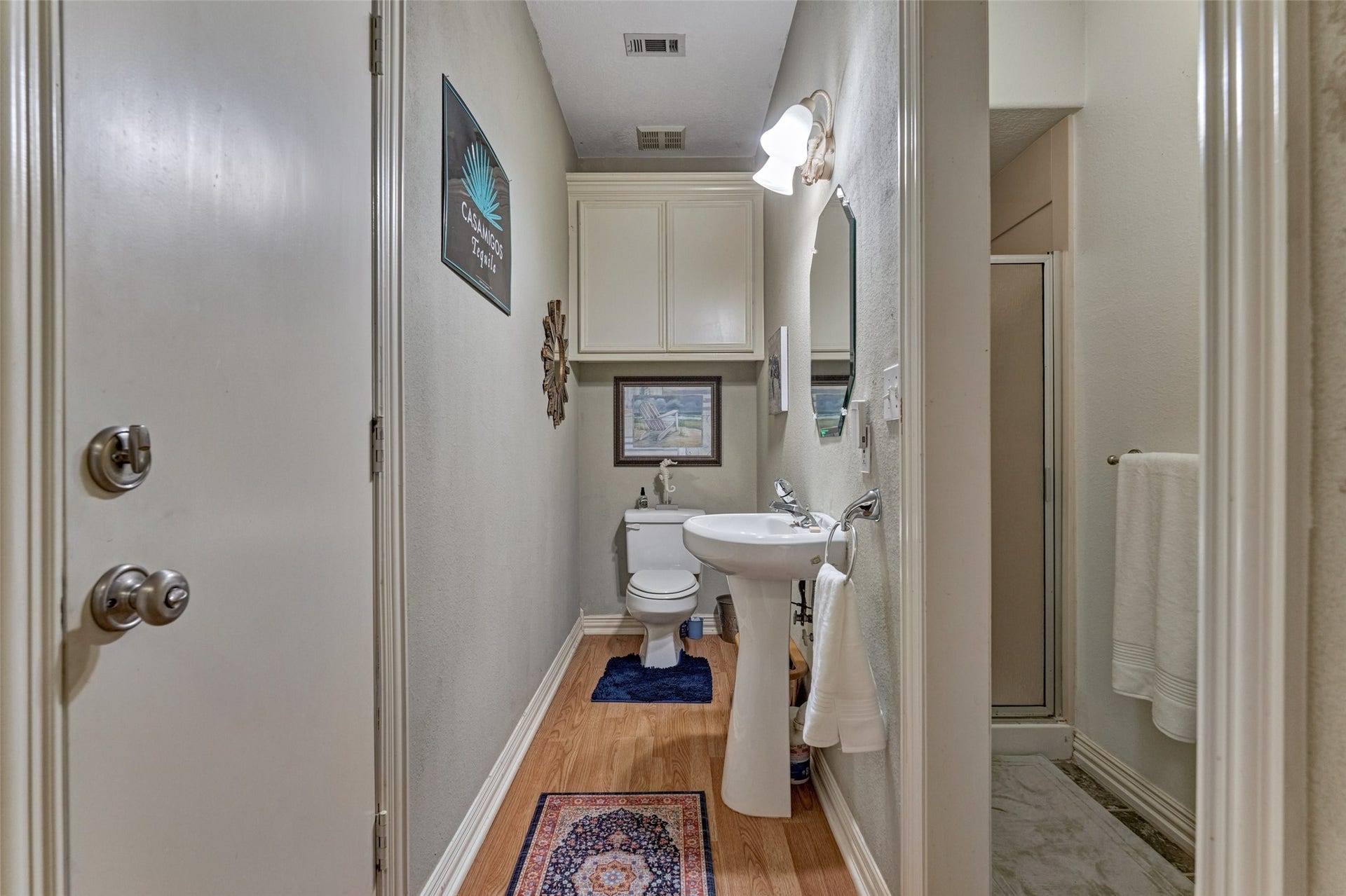 28911 Sapphire Circle, Magnolia, TX 77355 Half bath with shower, entrance from back patio and also from garage and utility room.