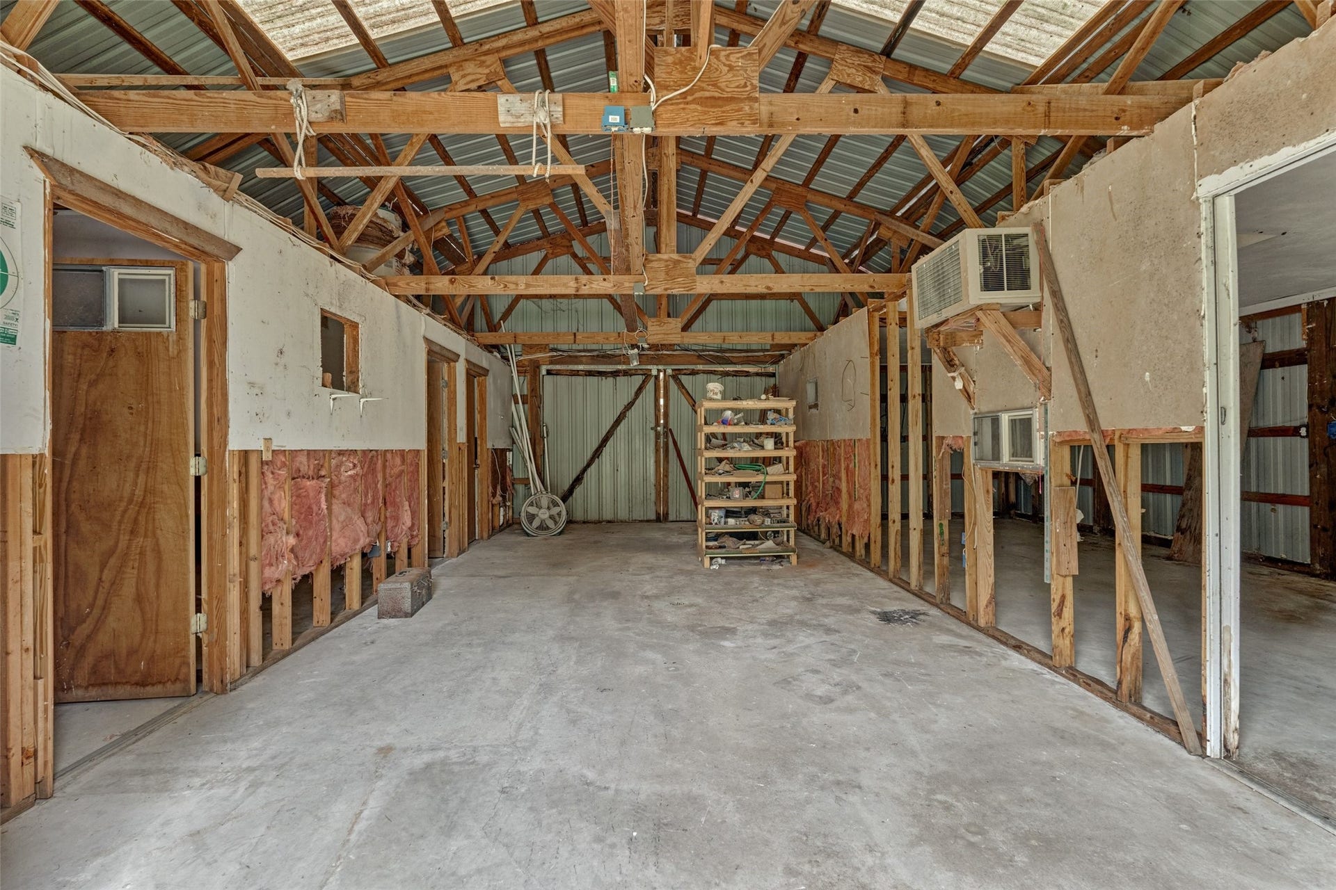 28911 Sapphire Circle, Magnolia, TX 77355 The metal pole barn has a concrete foundation and was once used as an apartment. Now ready for your workshop or space for whatever you can imagine!