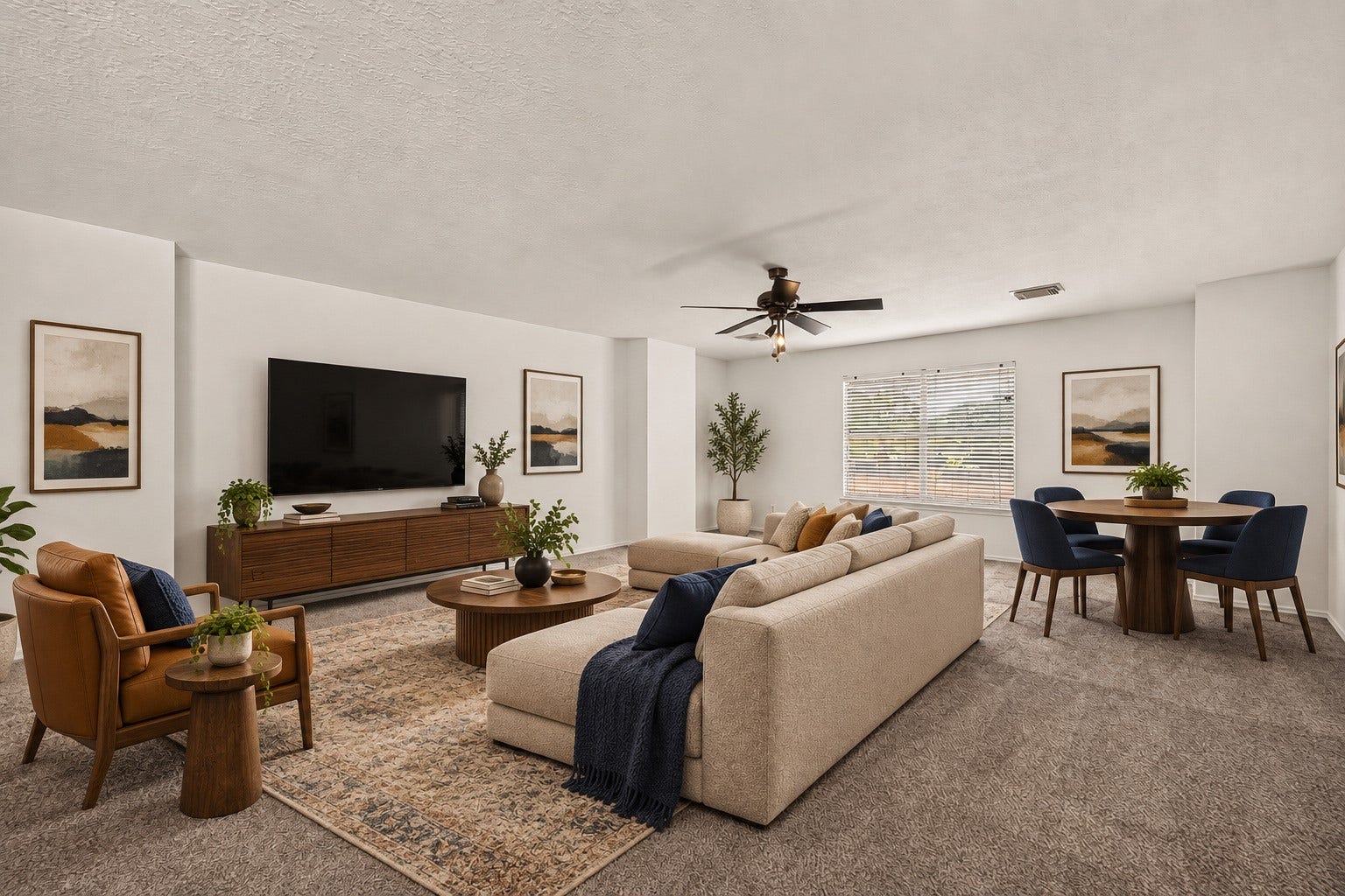 3111 Lantern Bay Lane, Katy, TX 77449 Spacious upstairs game room with a ceiling fan and window. Virtually staged.