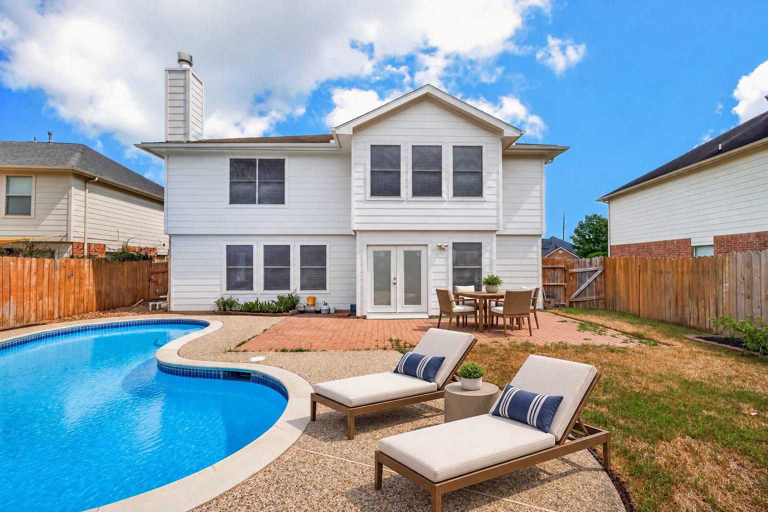 3111 Lantern Bay Lane, Katy, TX 77449 Your own backyard escape: cool off in the private pool, then relax on the patio with room to entertain. Virtually staged.