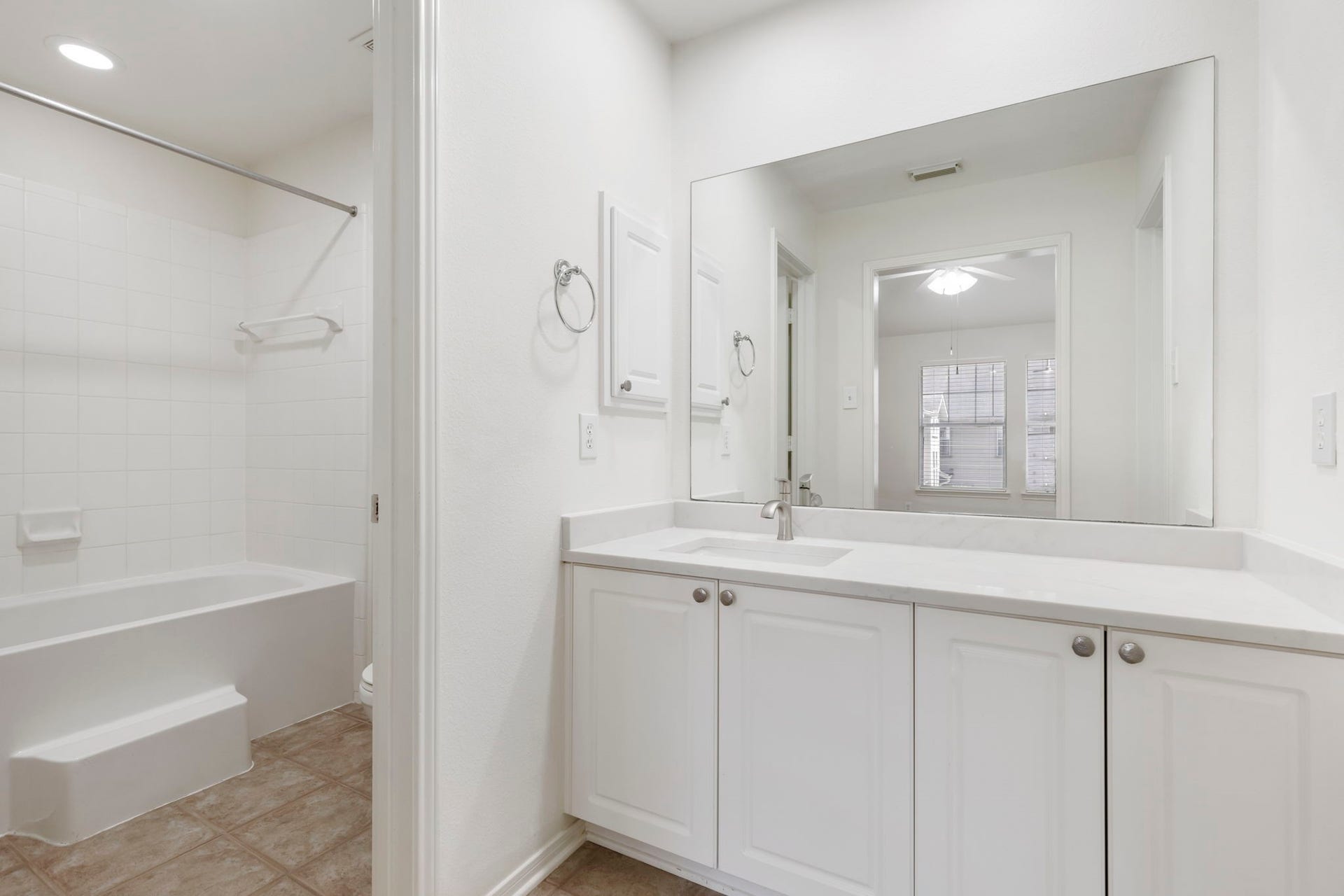 Primary bath with brand new countertops.