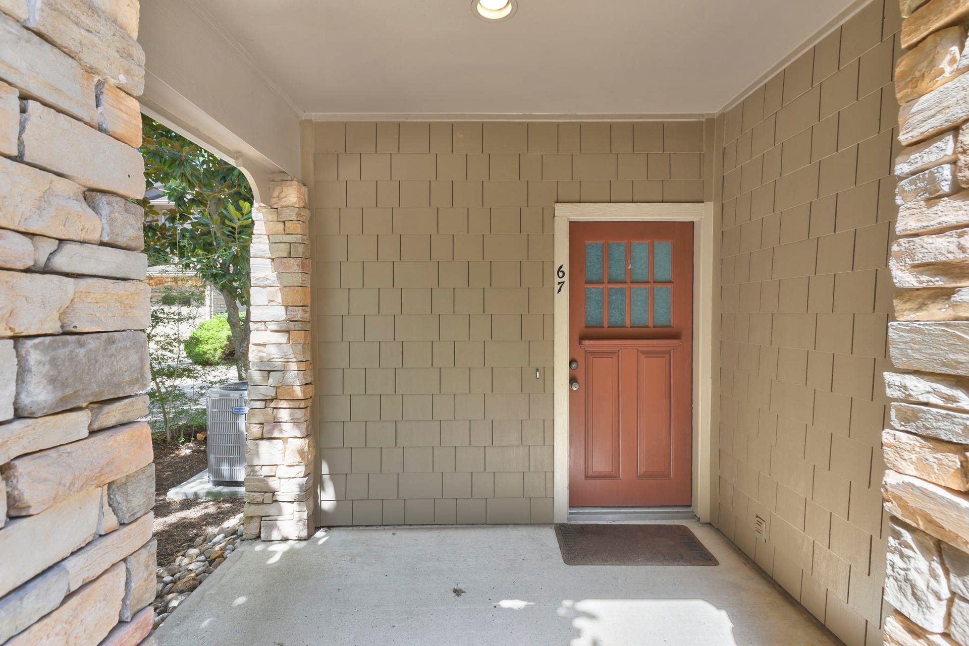 Spacious and charming covered entry to welcome you home.