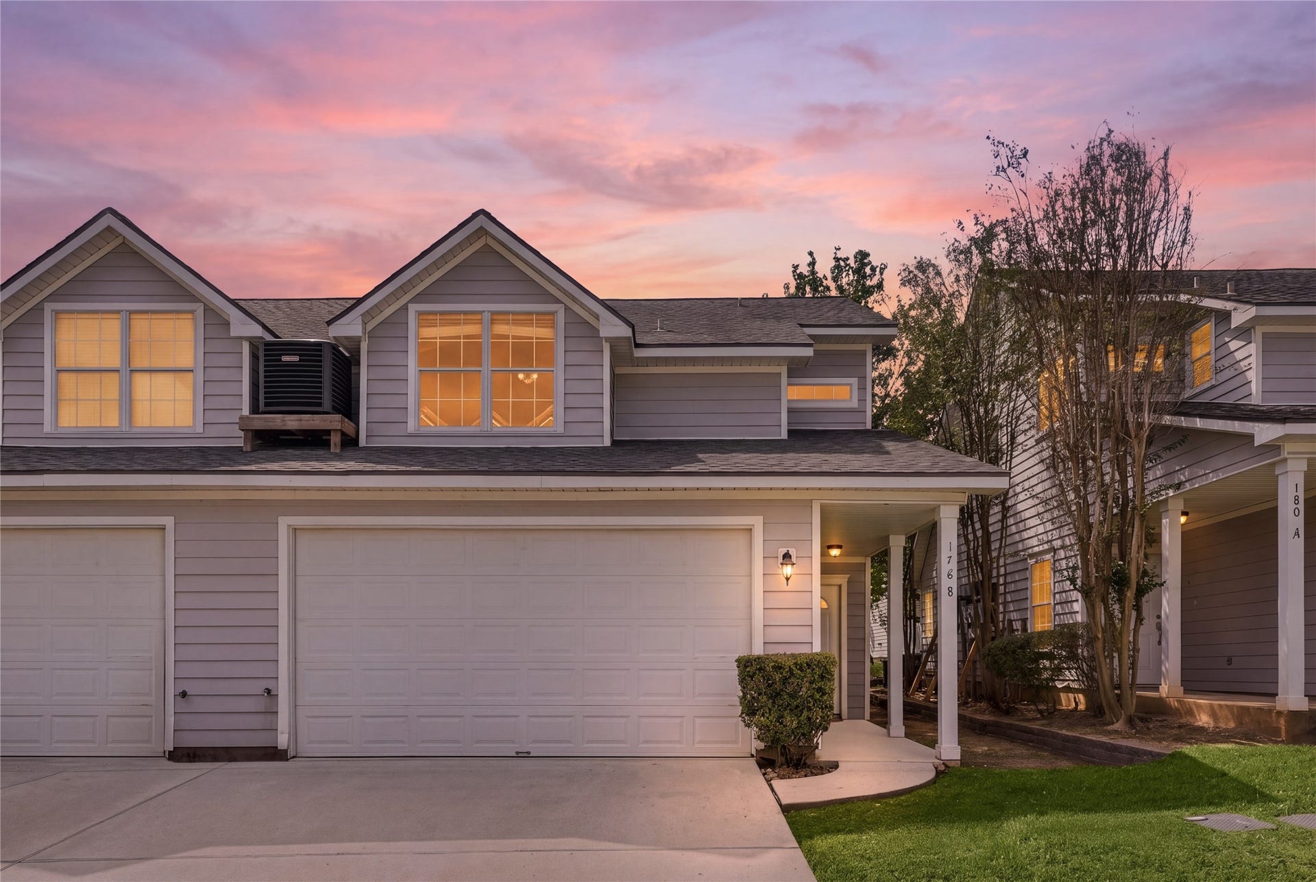 front of home at sunset