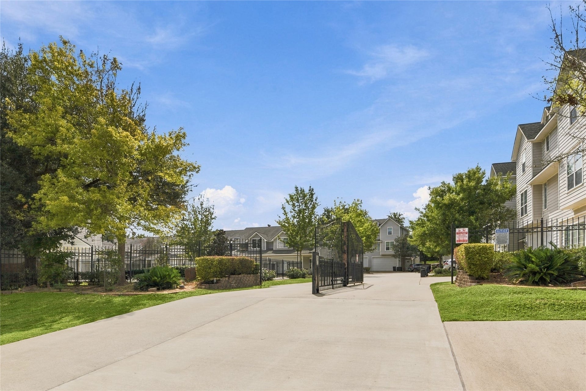 entrance to Northstar Townhomes. The ground outside and inside the gates is Binnacle Court