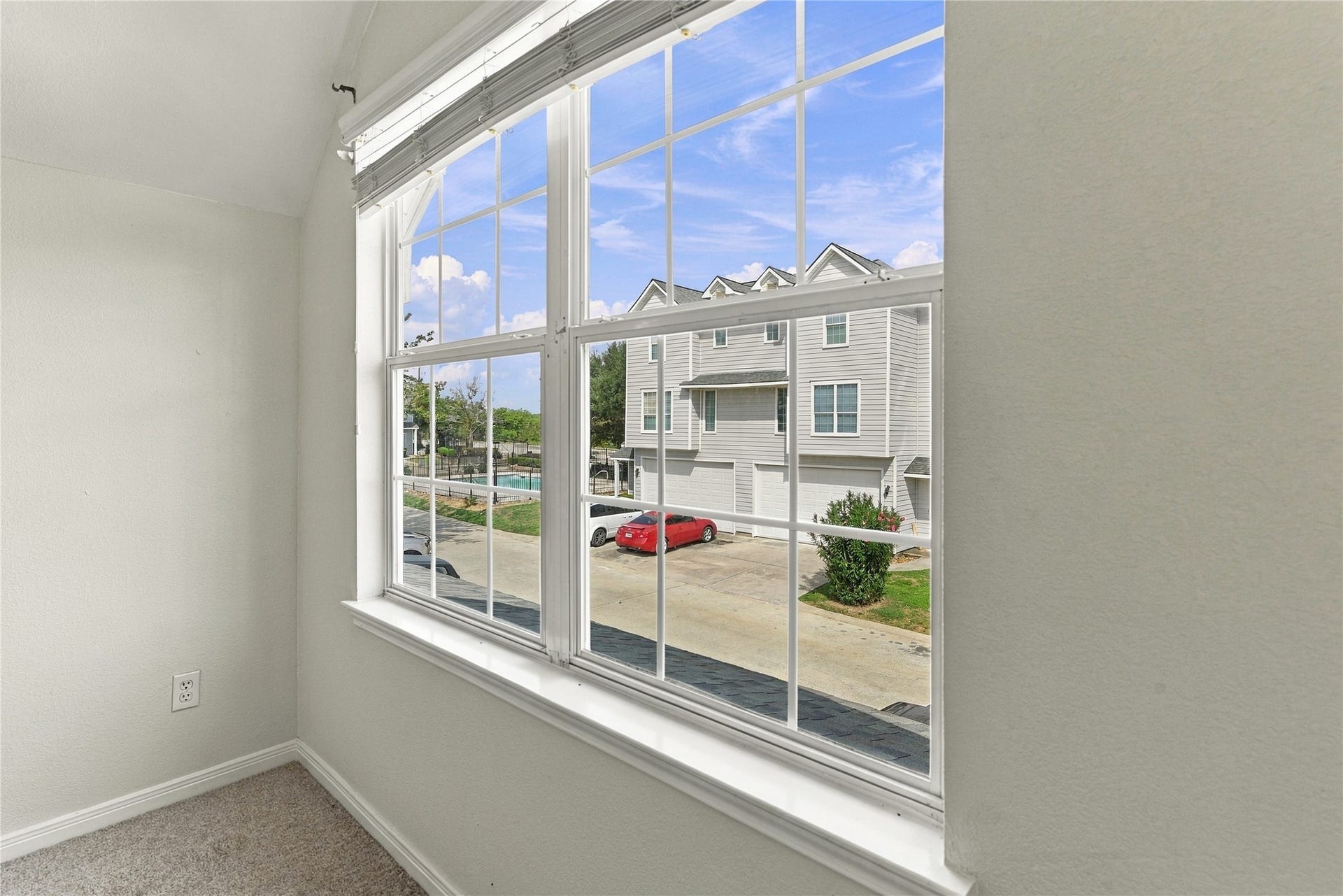 primary bedroom has view of pool