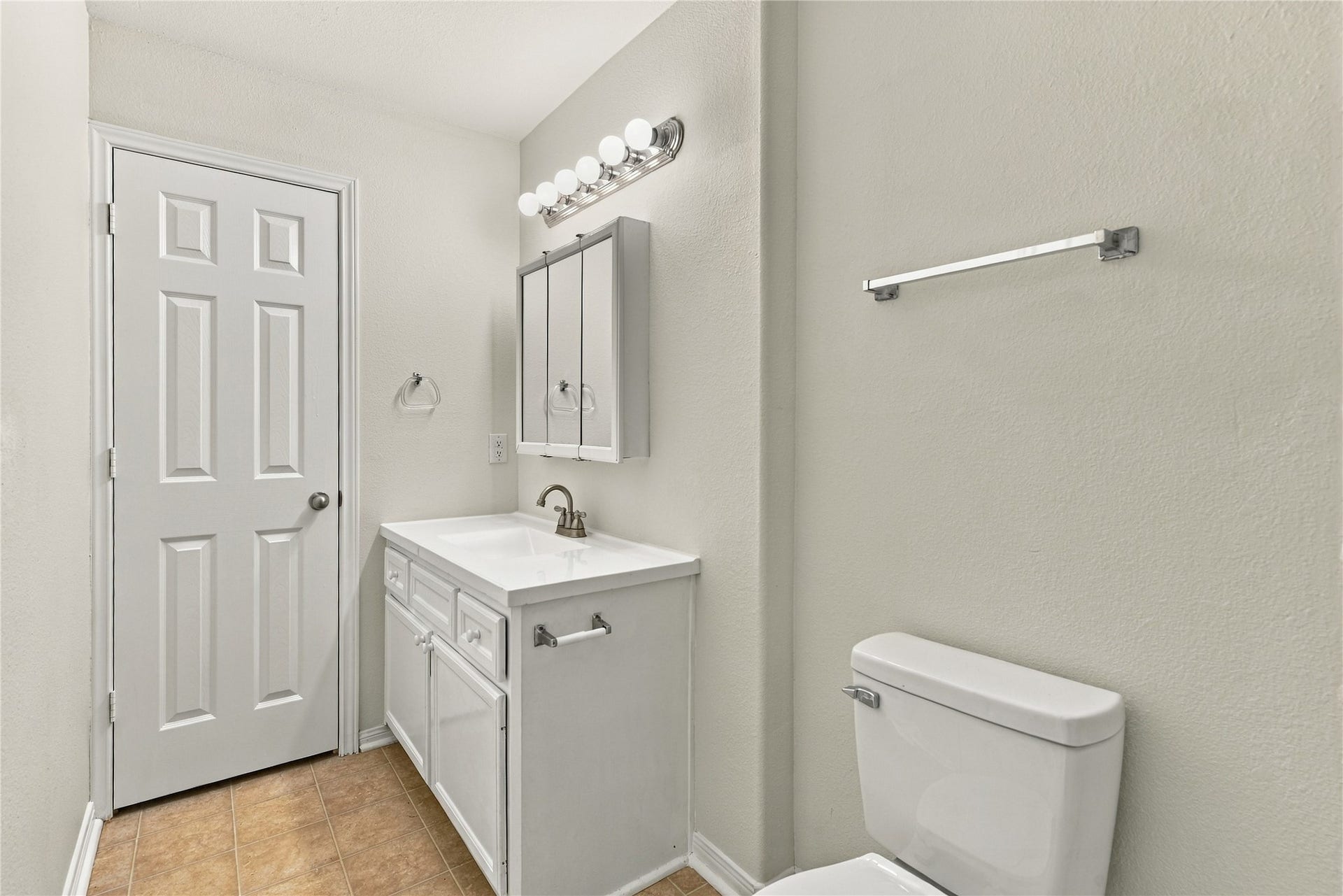 primary bathroom, door on the left is linen closet