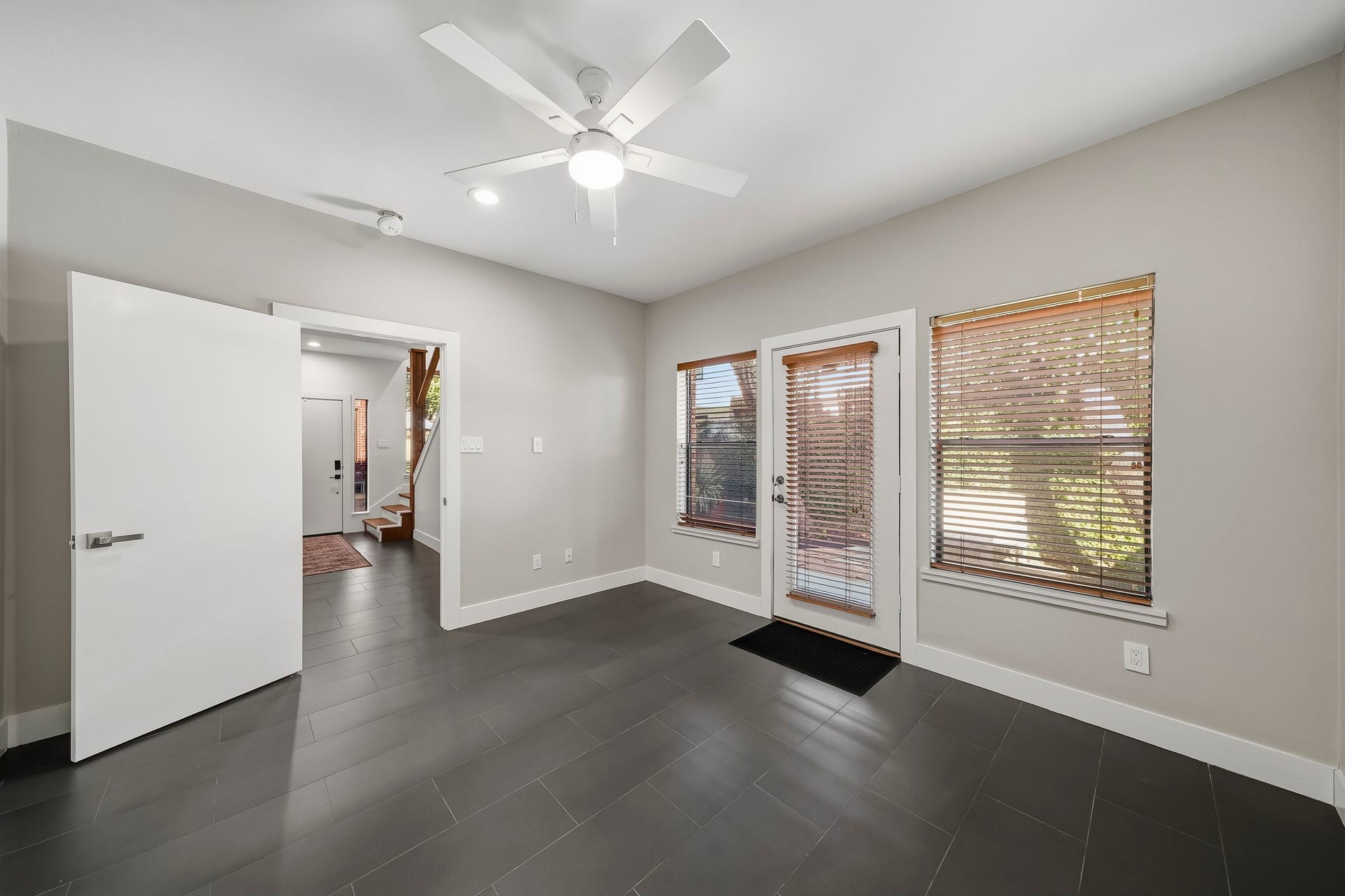 910 Malone Street, #106, Houston, TX 77007 A private patio extends from the third bedroom, offering a secluded outdoor escape and an added touch of luxury to this versatile space.