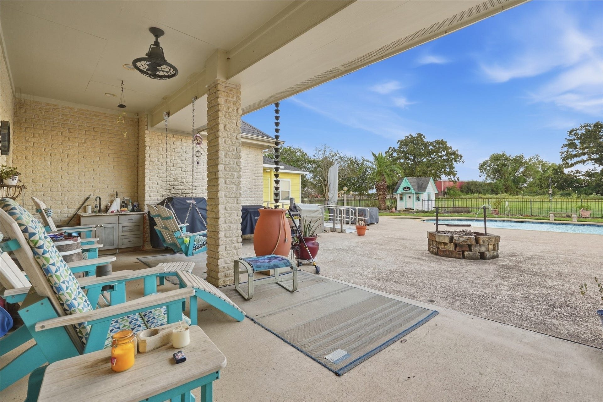 29101 Fm 1736 Road, Hempstead, TX 77445 SPACIOUS BACK PORCH OVERLOOKING THE COUNTRY STYLE BACK YARD