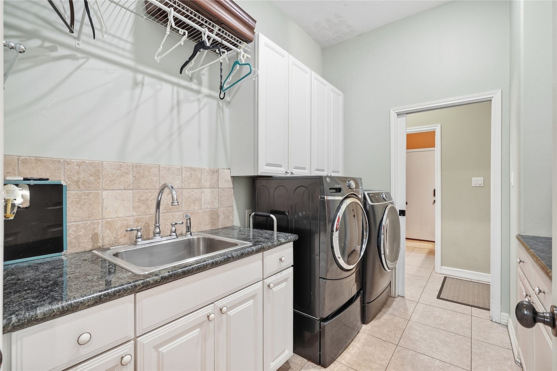 29101 Fm 1736 Road, Hempstead, TX 77445 LAUNDRY ROOM WITH PLENTY OF COUNTER SPACE AND SINK