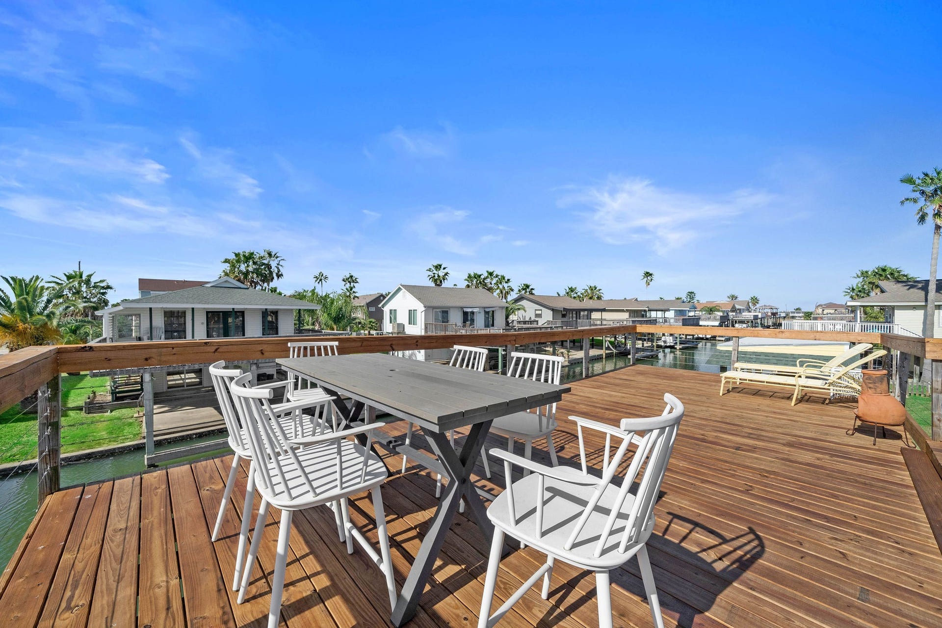 16610 Nassau Way, Galveston, TX 77554 Spacious waterfront deck perfect for entertaining, with stunning views and ample seating.