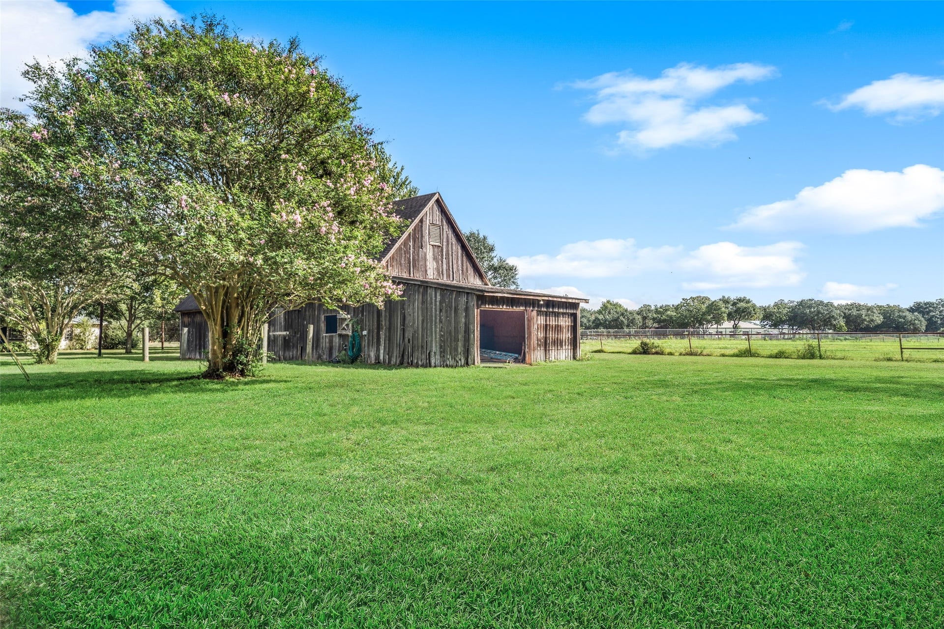 38914 Sampson Road, Brookshire, TX 77423 A three-stall barn completes the property, ready for horses and country living.