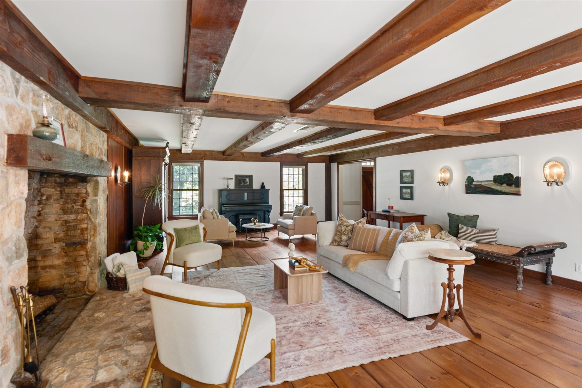 38914 Sampson Road, Brookshire, TX 77423 Anchored by an impressive stone fireplace, this living room was made for slow mornings, cozy evenings and gathering together.