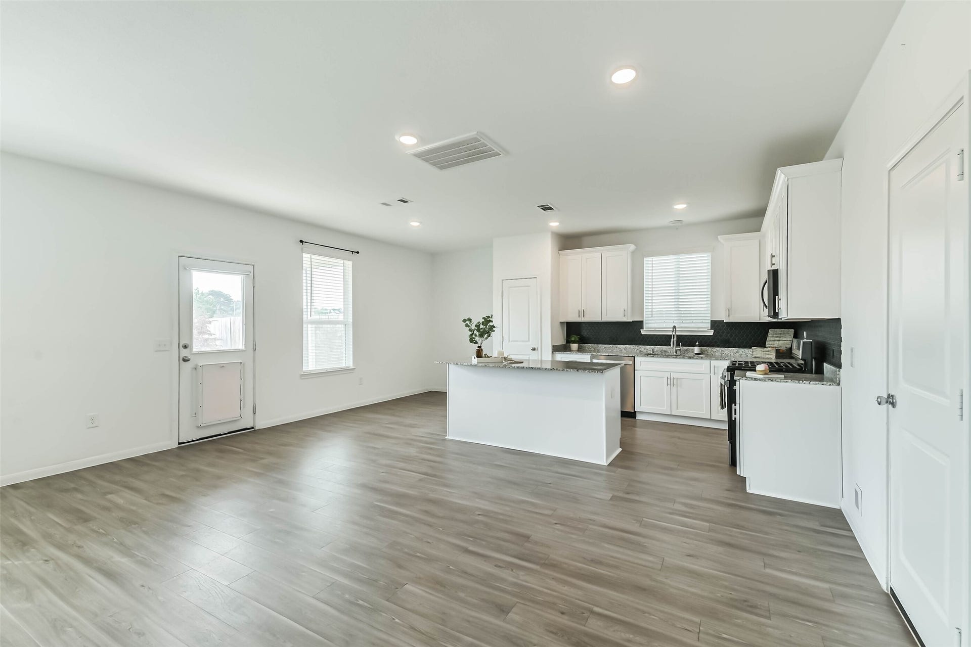 25631 Balsamroot Drive, Magnolia, TX 77355 There are multiple ways to work the open living, dining, and kitchen area, depending on your needs.