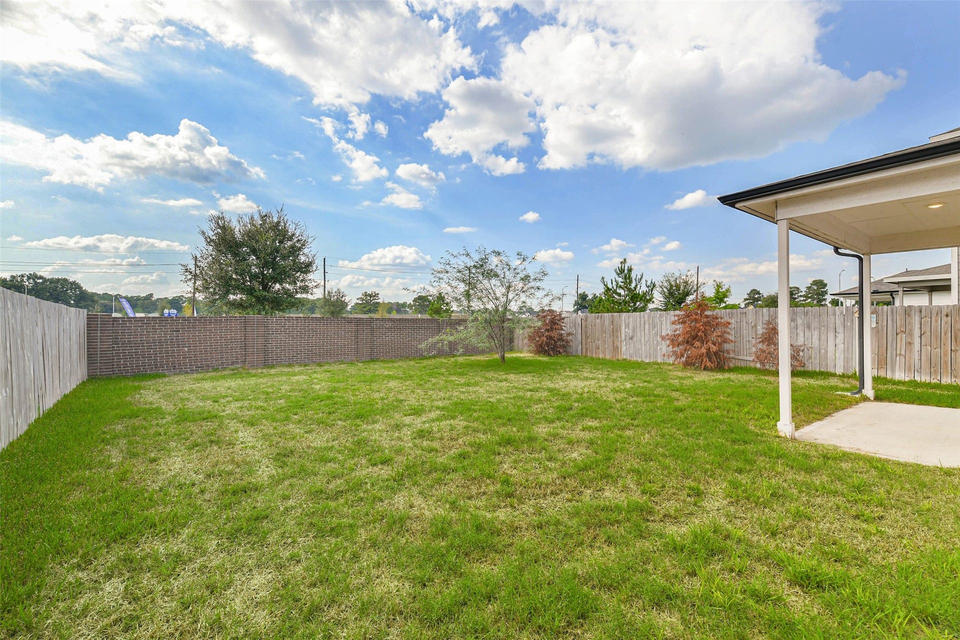 25631 Balsamroot Drive, Magnolia, TX 77355 Large fully, fenced backyard.