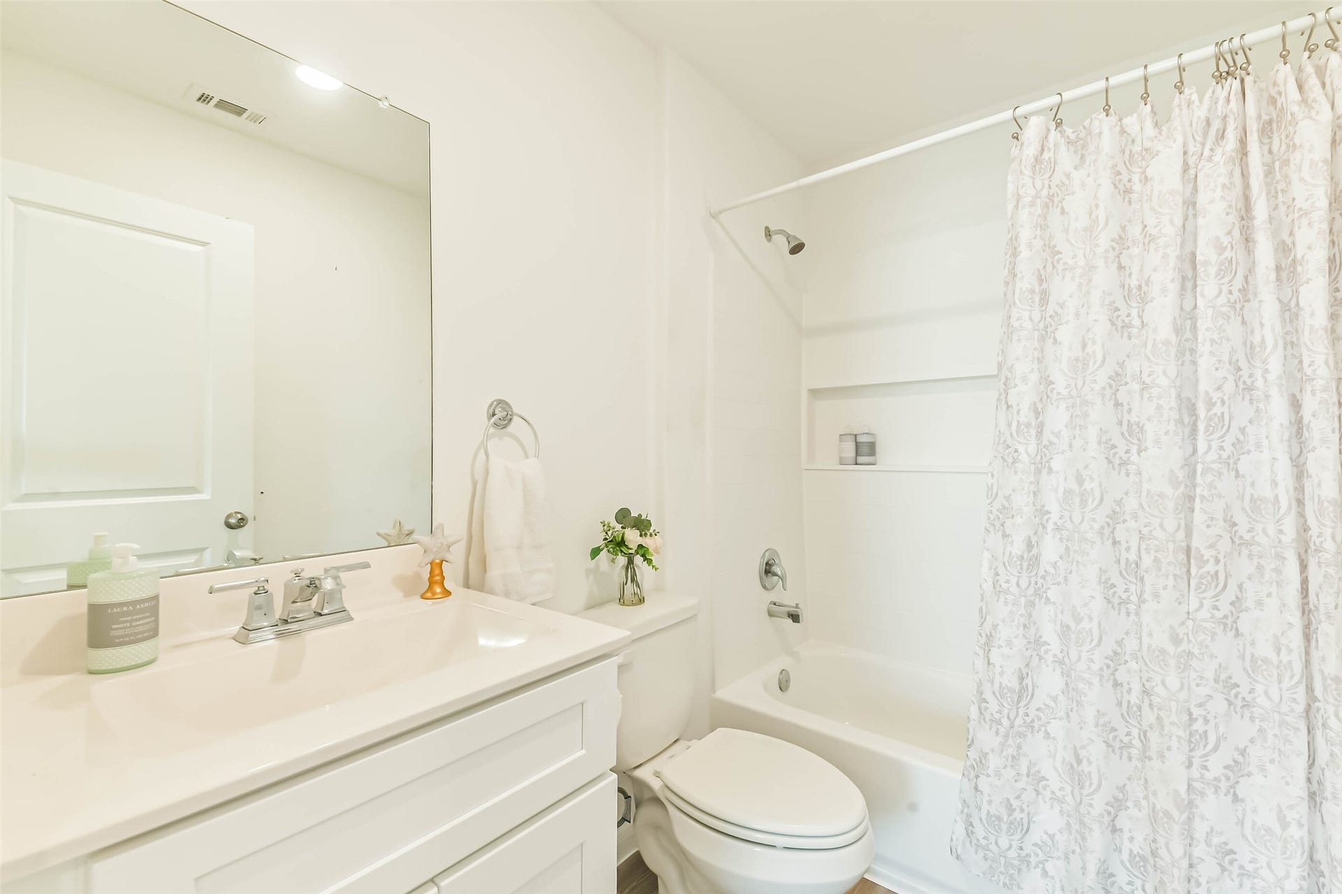 25631 Balsamroot Drive, Magnolia, TX 77355 Traditional full bath with practical storage.