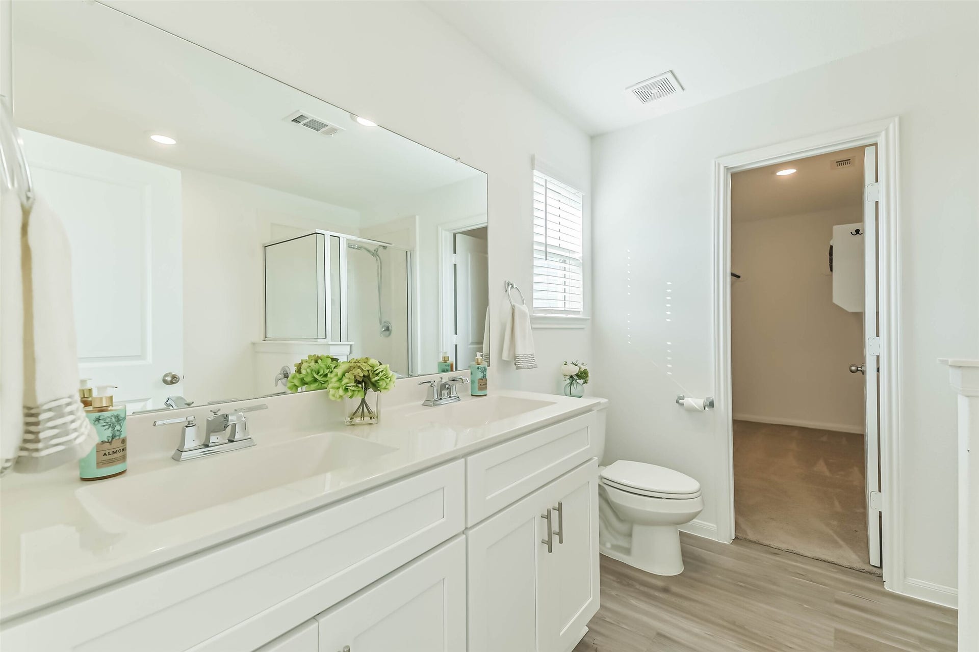 25631 Balsamroot Drive, Magnolia, TX 77355 Primary bathroom features double sinks and bright recessed lighting.