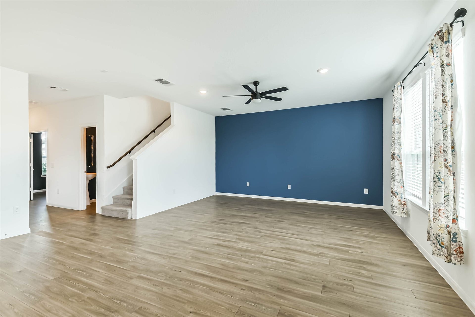 25631 Balsamroot Drive, Magnolia, TX 77355 View of the living room back to the foyer.