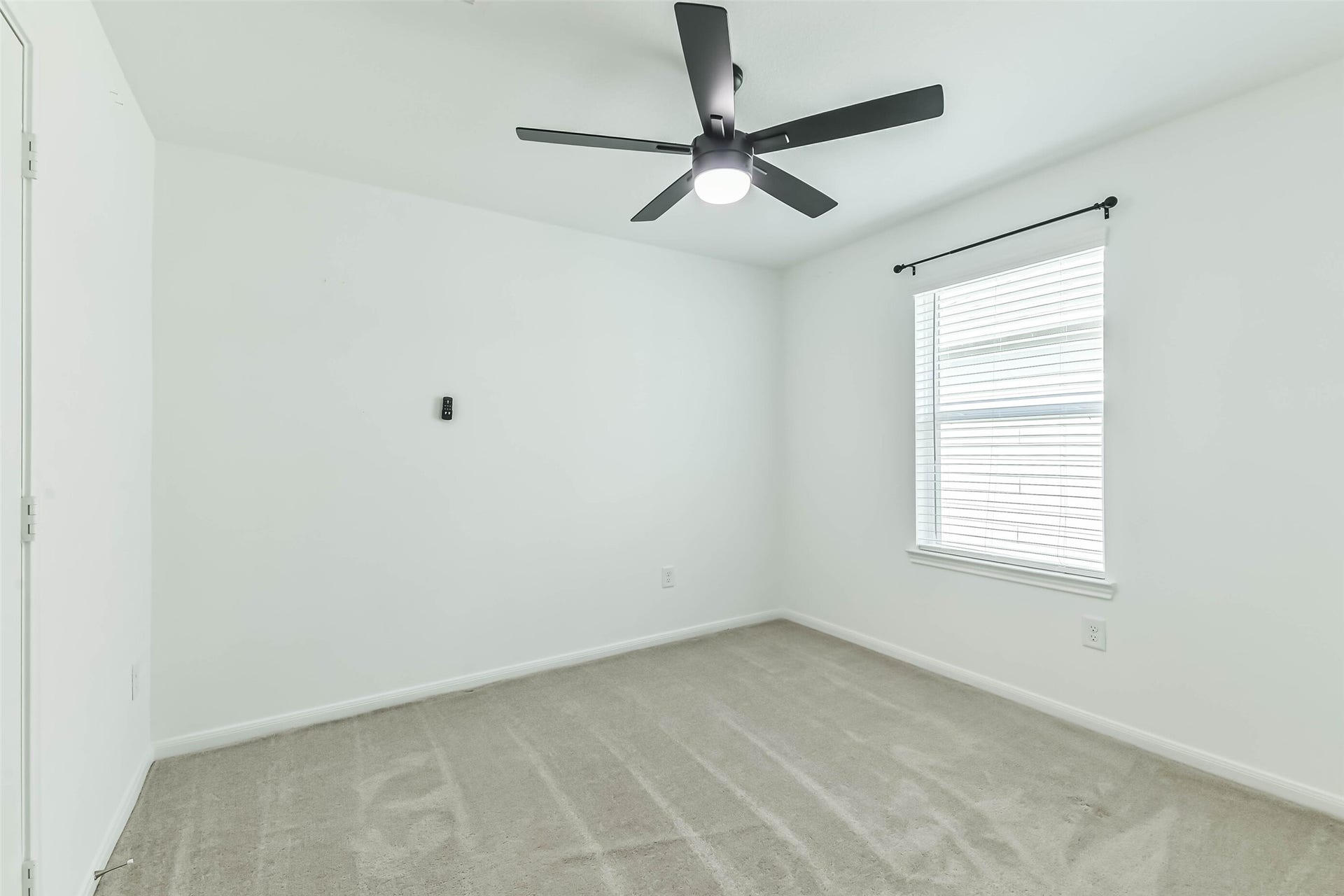 25631 Balsamroot Drive, Magnolia, TX 77355 The second bedroom with modern ceiling fan.