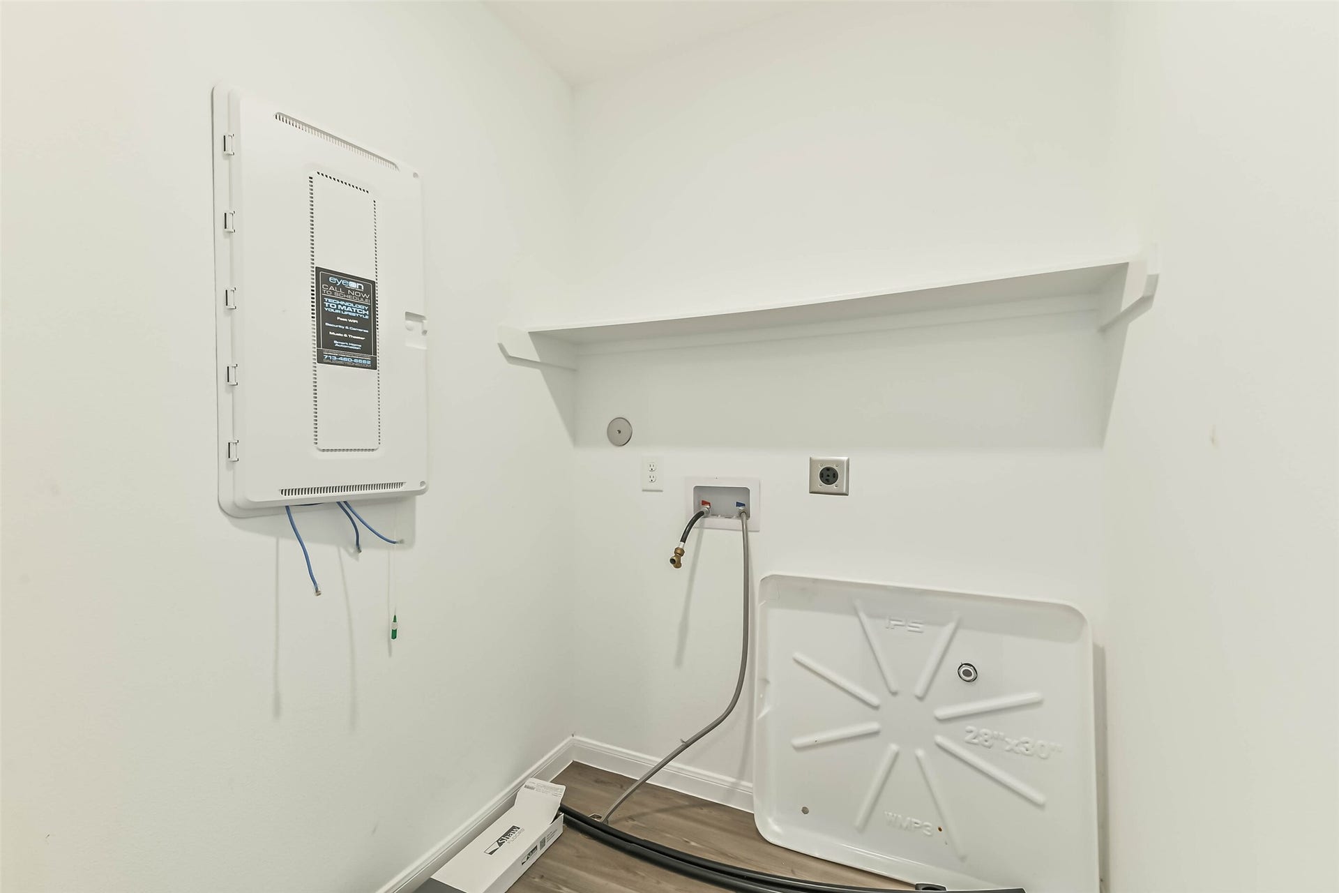 25631 Balsamroot Drive, Magnolia, TX 77355 Dedicated laundry room with convenient storage shelf.