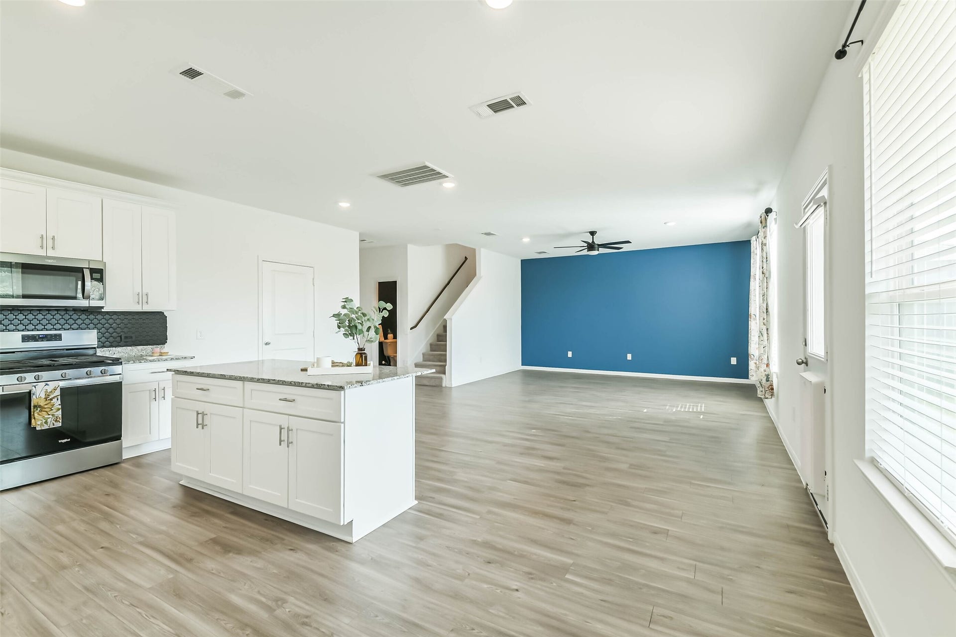 25631 Balsamroot Drive, Magnolia, TX 77355 View of the dining area and into the living room.