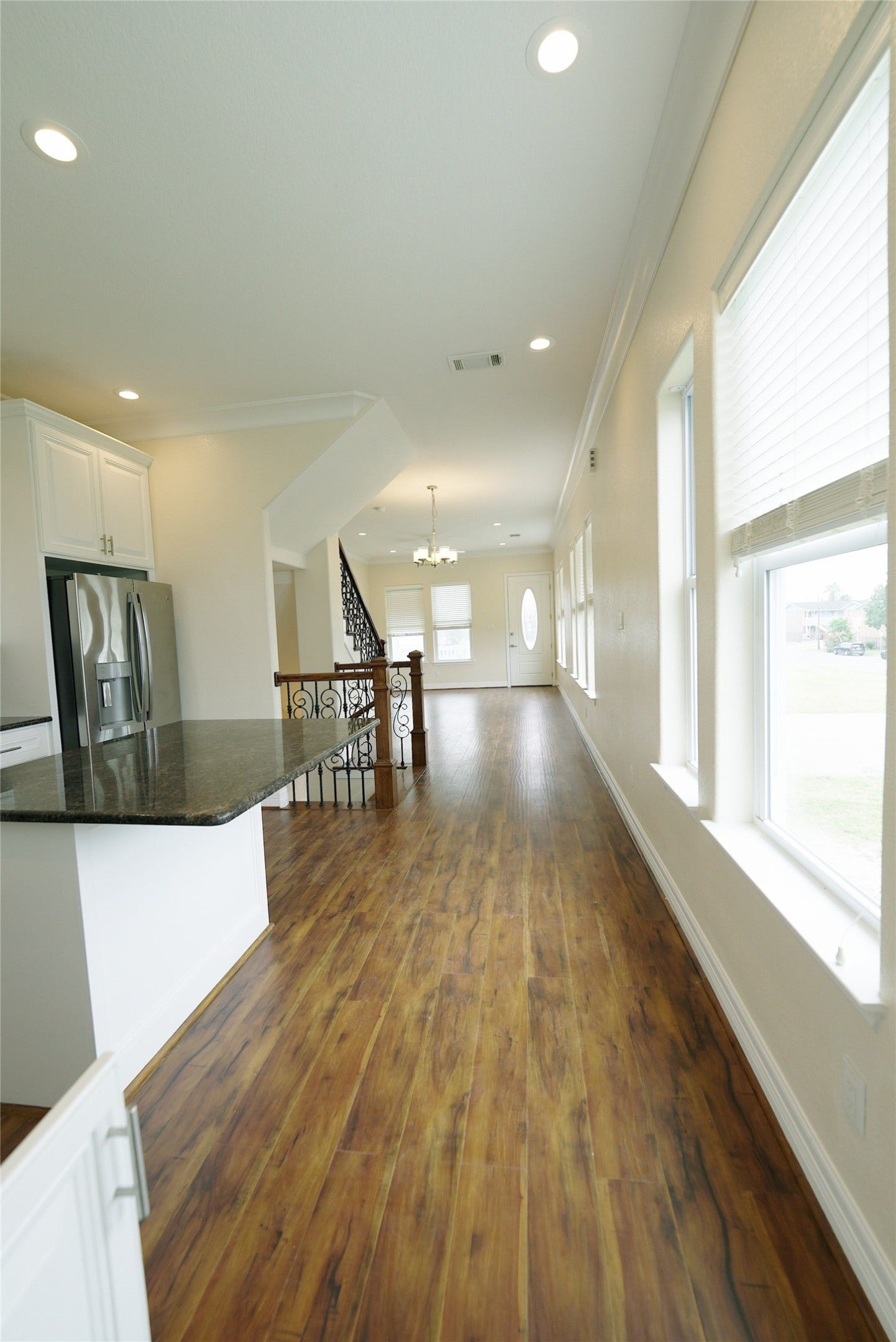 1013 10th Street, Galveston, TX 77550 Second-level unit featuring elegant hardwood floors, recessed lighting, and abundant natural light. Currently tenant occupied.