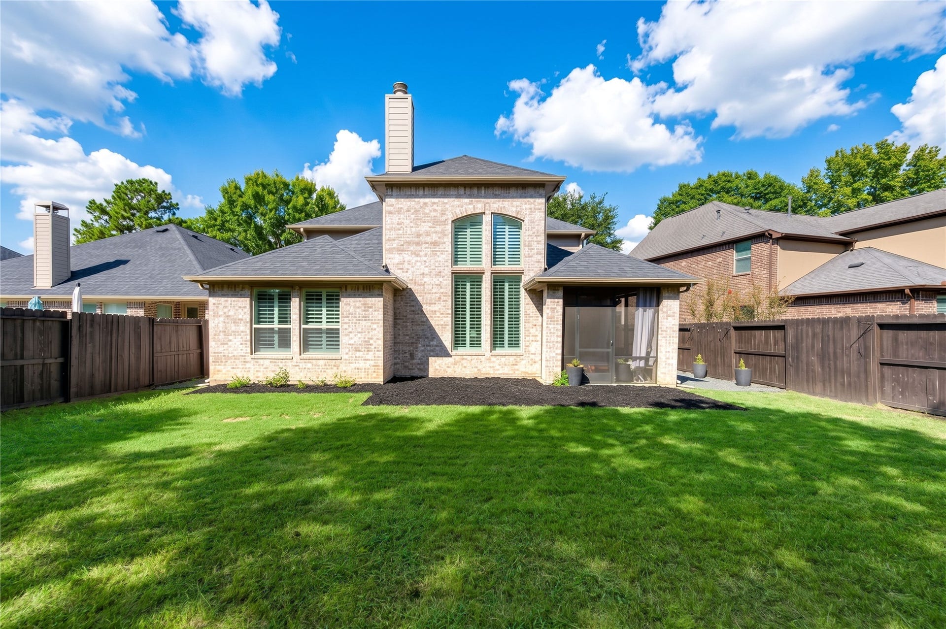 The spacious backyard offers plenty of room to create your ideal outdoor retreat, with space for a future pool, trampoline, fire pit, and more!