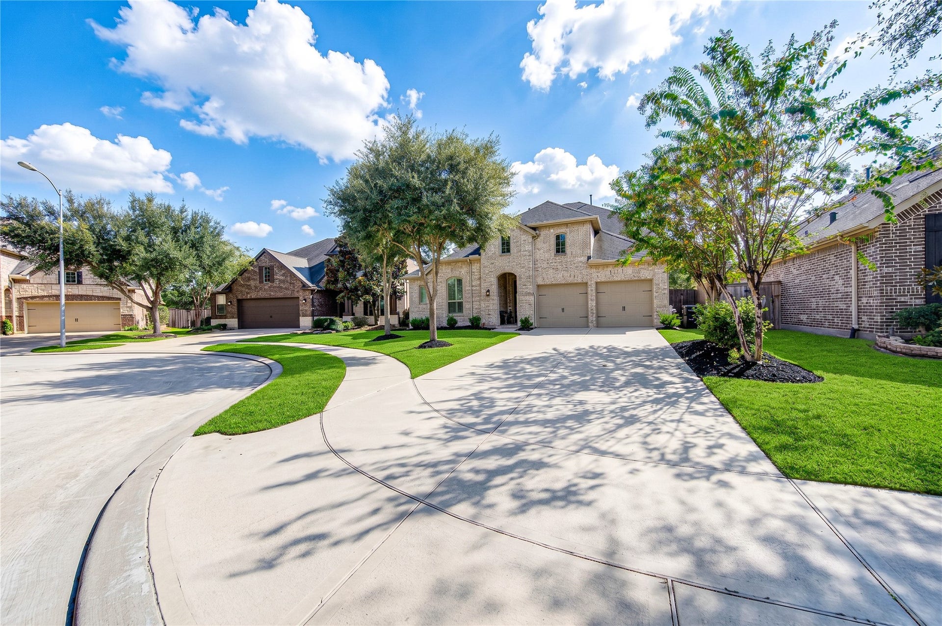 The homes striking brick surround creates a grand, welcoming first impression, complemented by a two-car garage and a desirable cul-de-sac location.