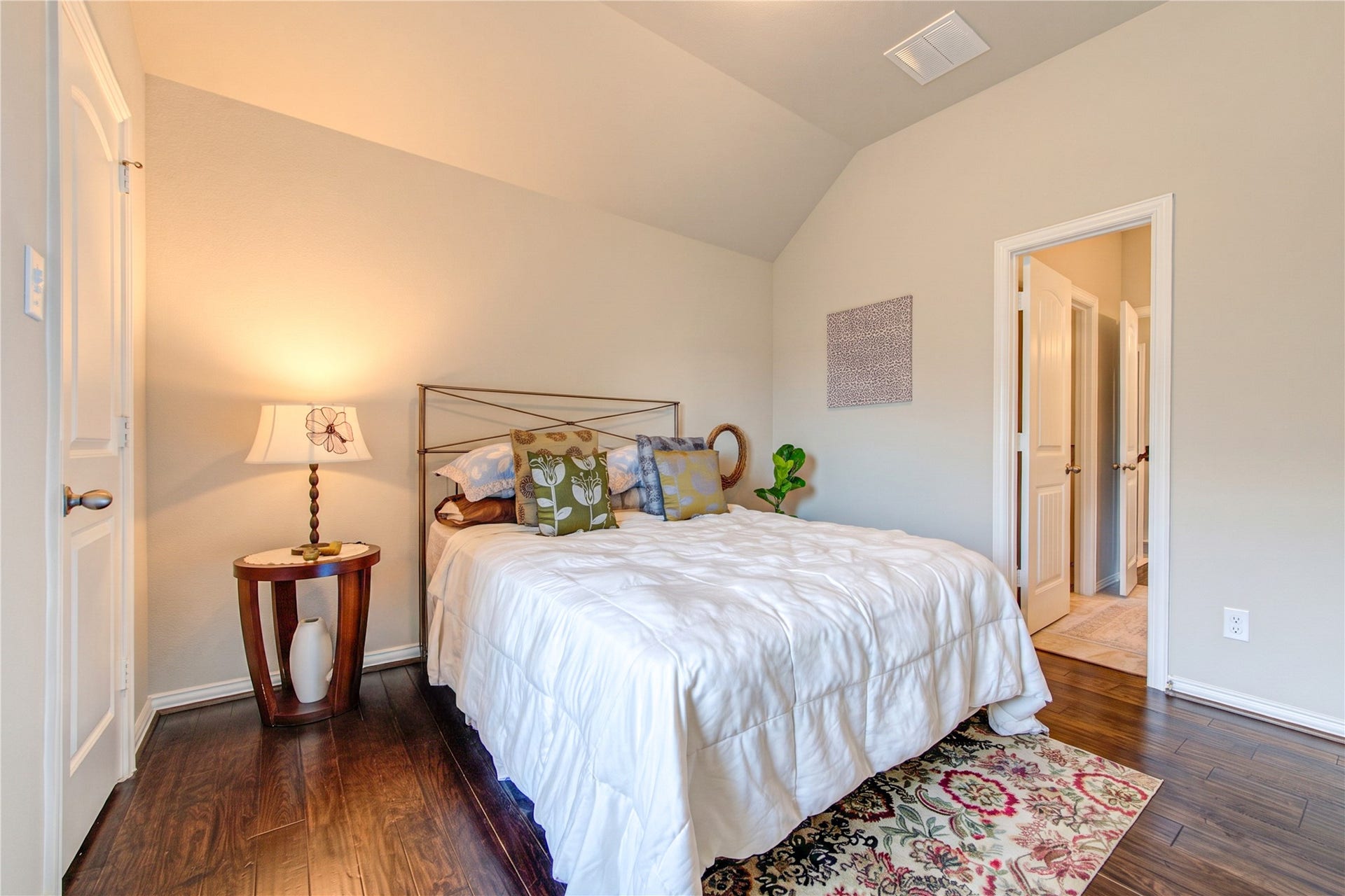The upstairs secondary bedroom offers a comfortable, versatile space.