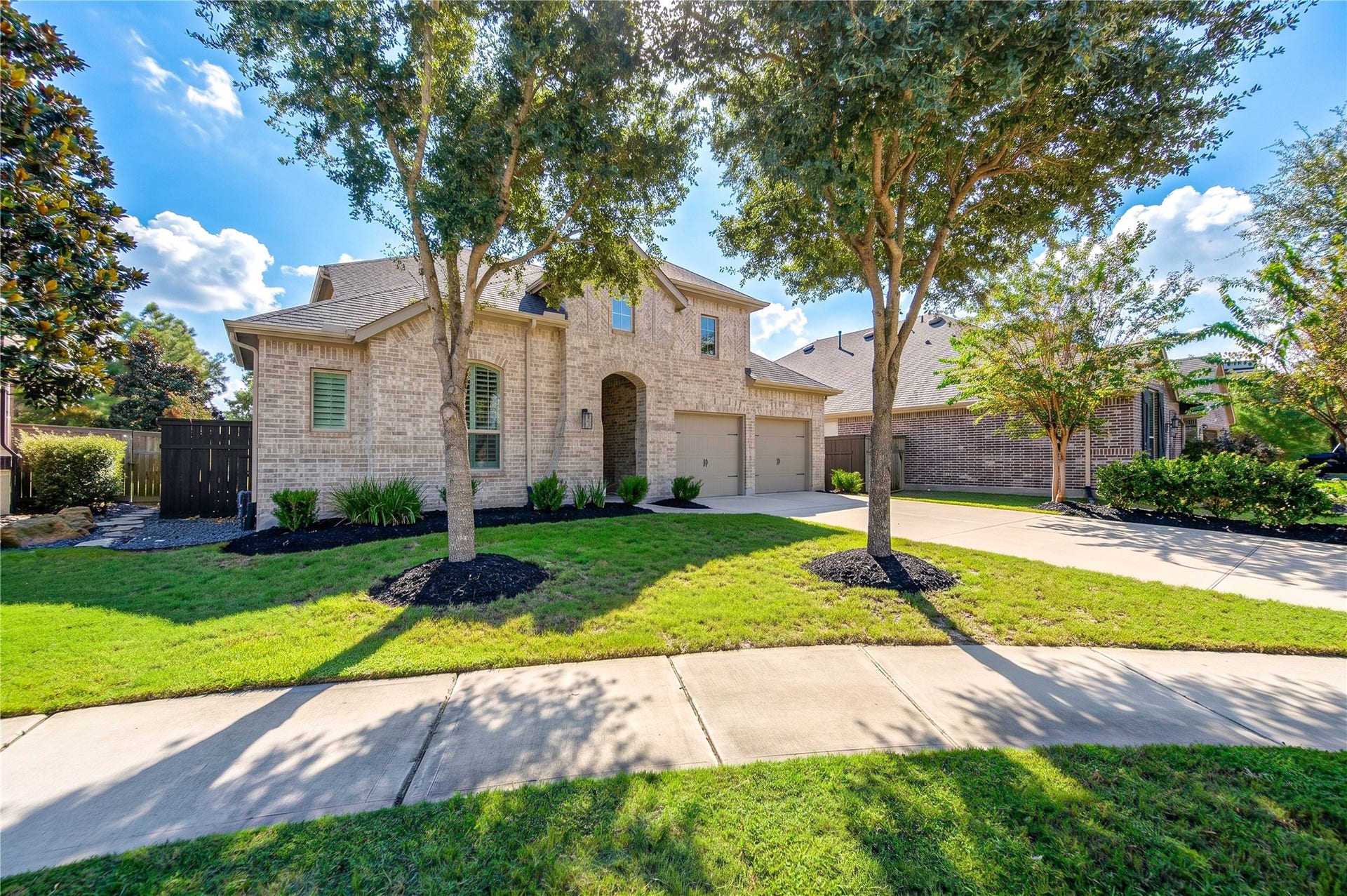 The homes striking brick surround creates a grand, welcoming first impression, complemented by a two-car garage and a desirable cul-de-sac location.
