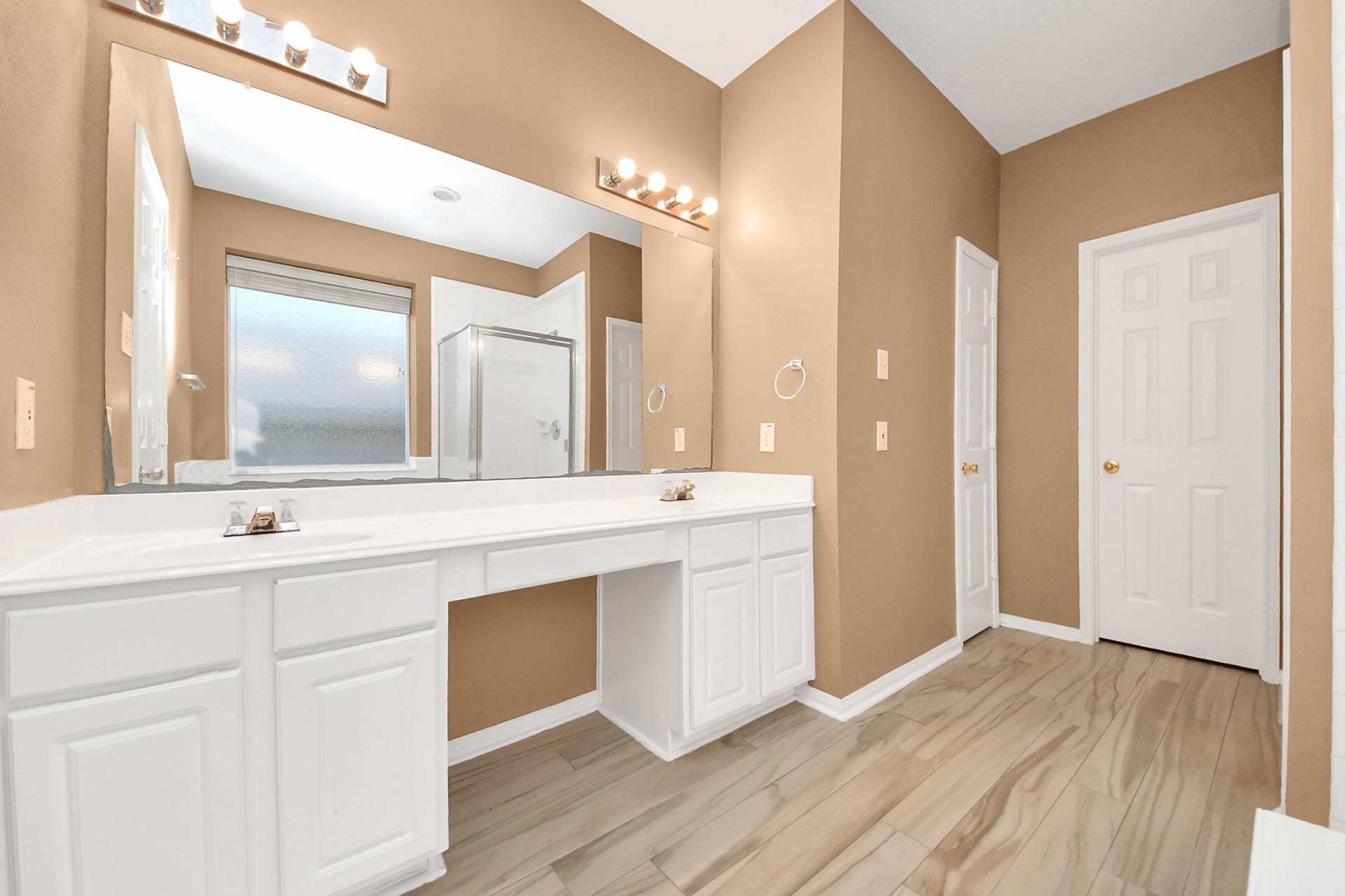 Primary restroom with double vanity