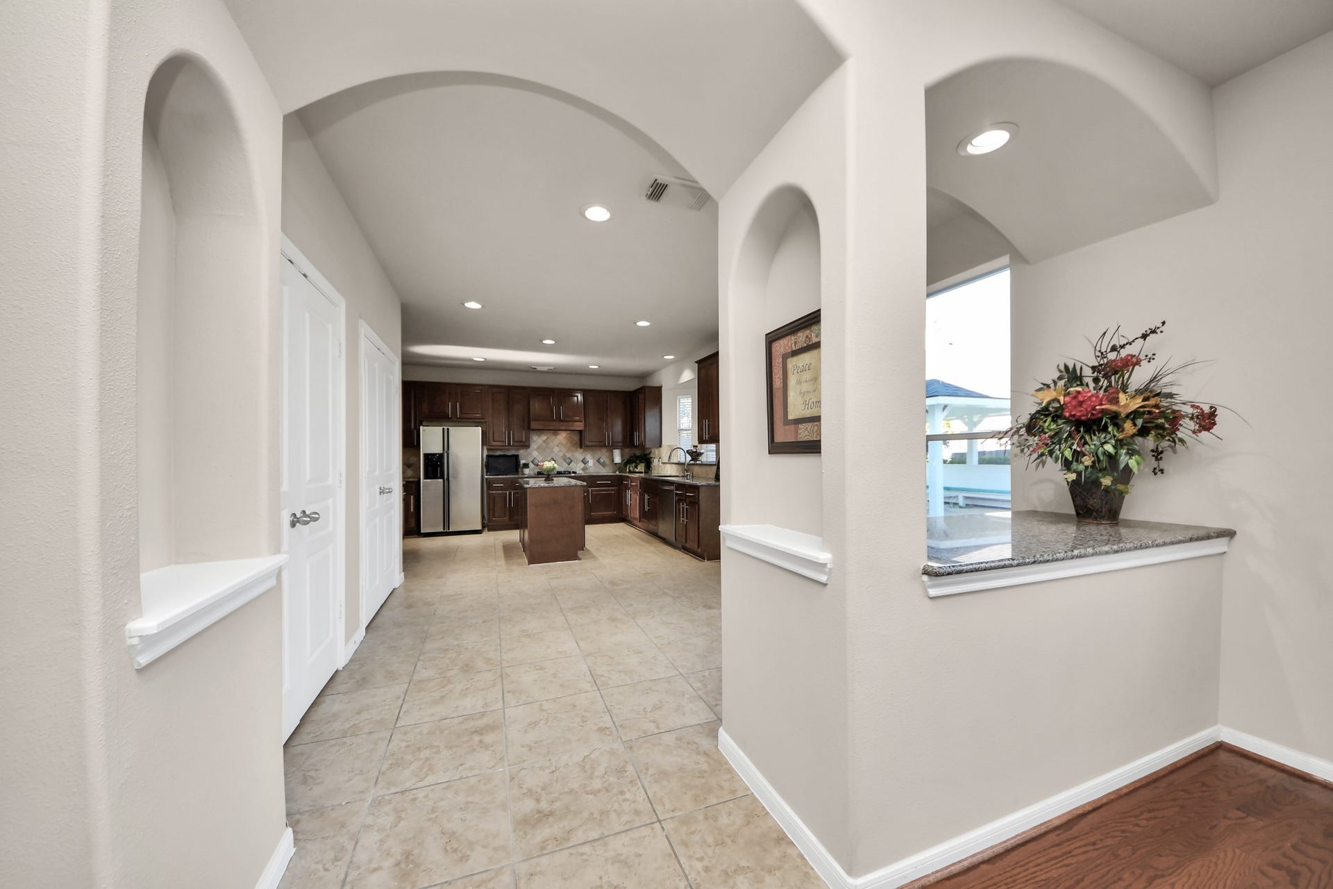17418 Memorial Mills Drive, Spring, TX 77379 Classic insets and elegant archways contribute to the timeless charm of this beautiful home.