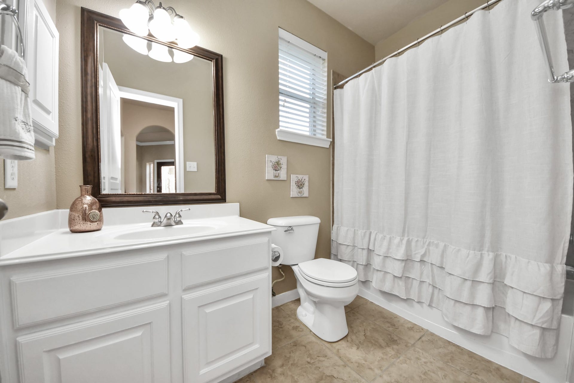 17418 Memorial Mills Drive, Spring, TX 77379 Before heading upstairs, check out the full bath conveniently located next to a generously sized bedroom, perfect for out-of-town guests, extended family, or a private mother-in-law suite!