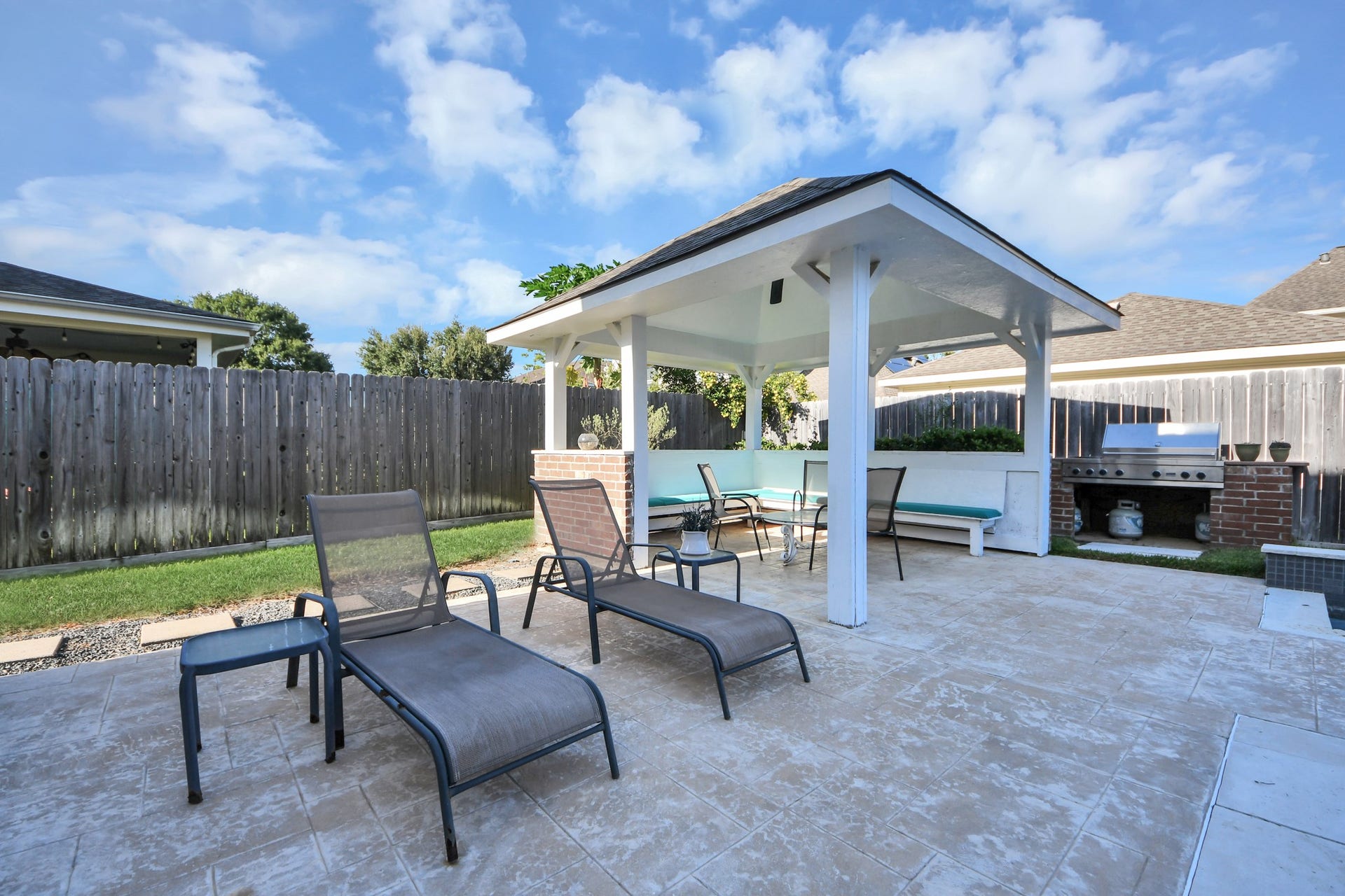 17418 Memorial Mills Drive, Spring, TX 77379 Take in the fresh air with a covered gazebo and outdoor grill, ideal for Texas BBQ's!