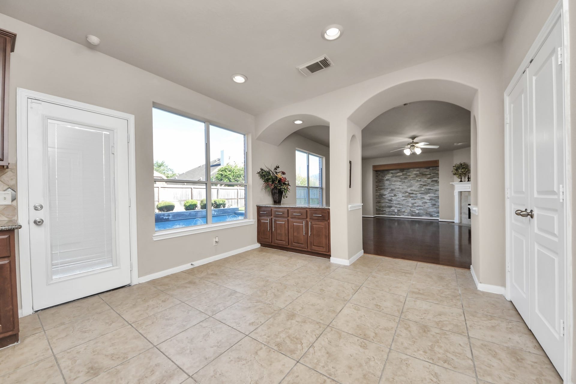 17418 Memorial Mills Drive, Spring, TX 77379 Custom cabinetry provides ample storage that extends beyond the kitchen, creating an ideal environment for culinary enthusiasts.