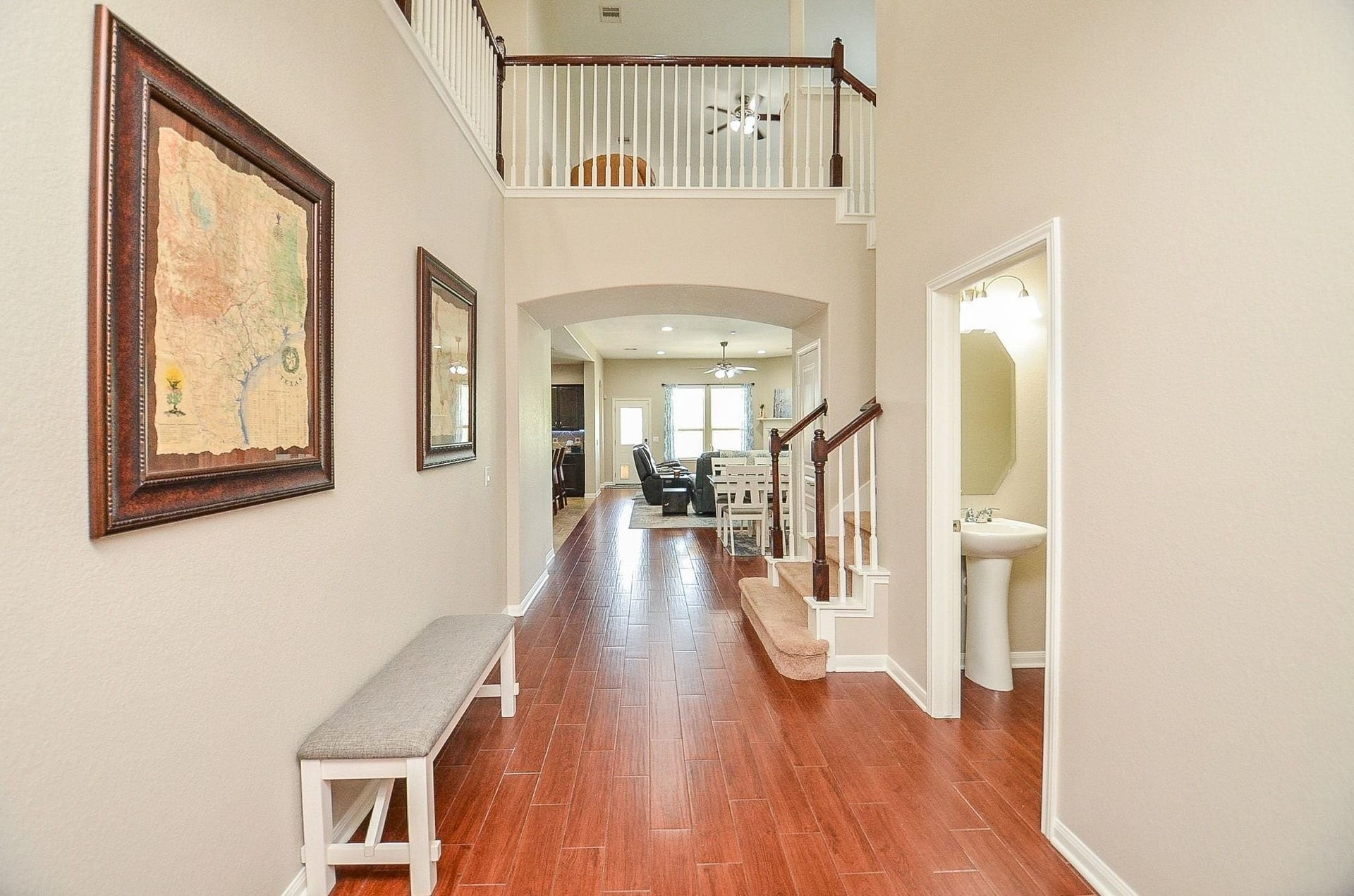 19802 Mulberry Pine Lane, Cypress, TX 77429 As you walk in, you will notice the wood-look tile and luxurious balconies.