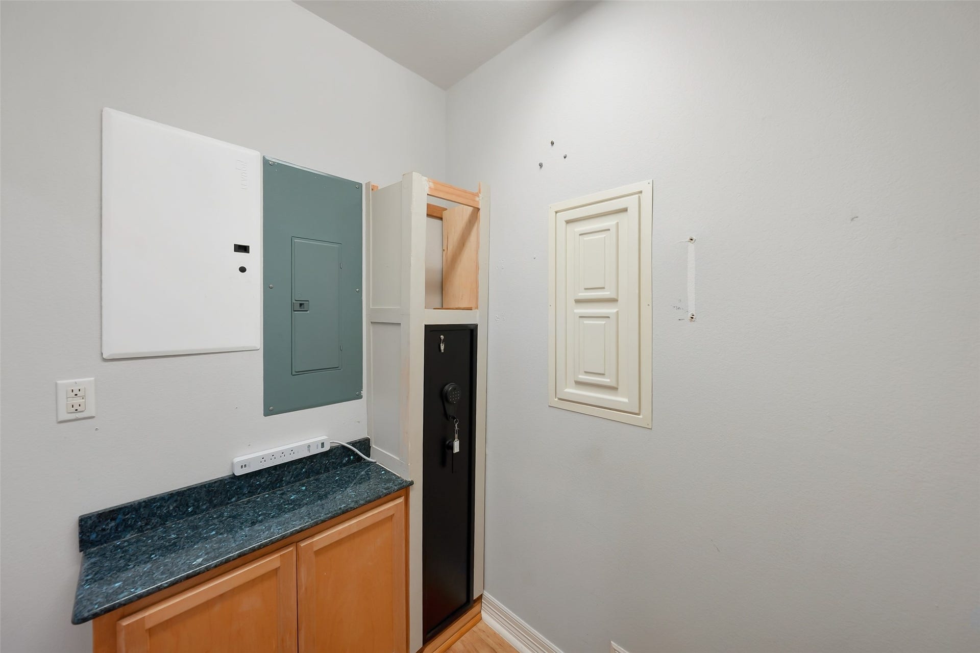 Utility Room - view 2 - notice the built-in safe in the back right corner