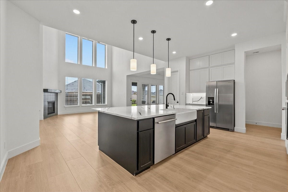 3013 Shelly Bayou Court, League City, TX 77573 Kitchen opens seamlessly to the inviting living room