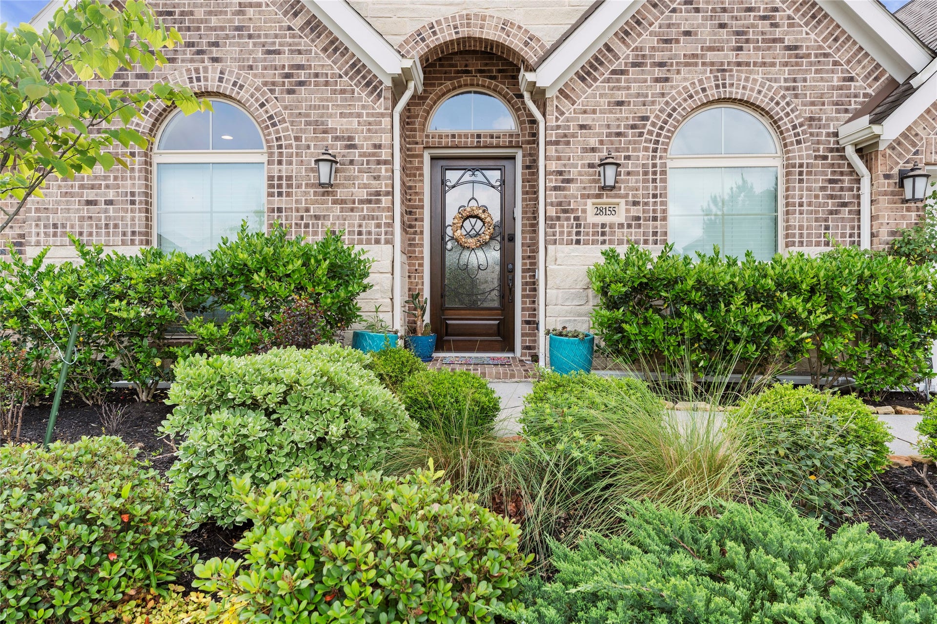28155 Briarwood Pass, Spring, TX 77386 Front entry with beautiful landscaping.