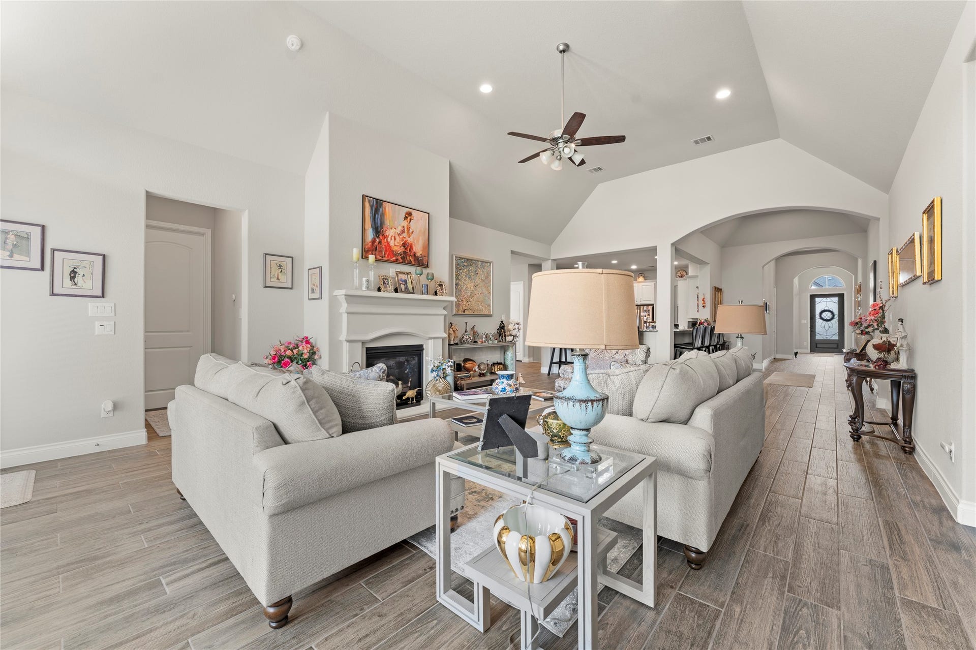 28155 Briarwood Pass, Spring, TX 77386 Beautiful view of elegant living room featuring natural light and high ceilings.