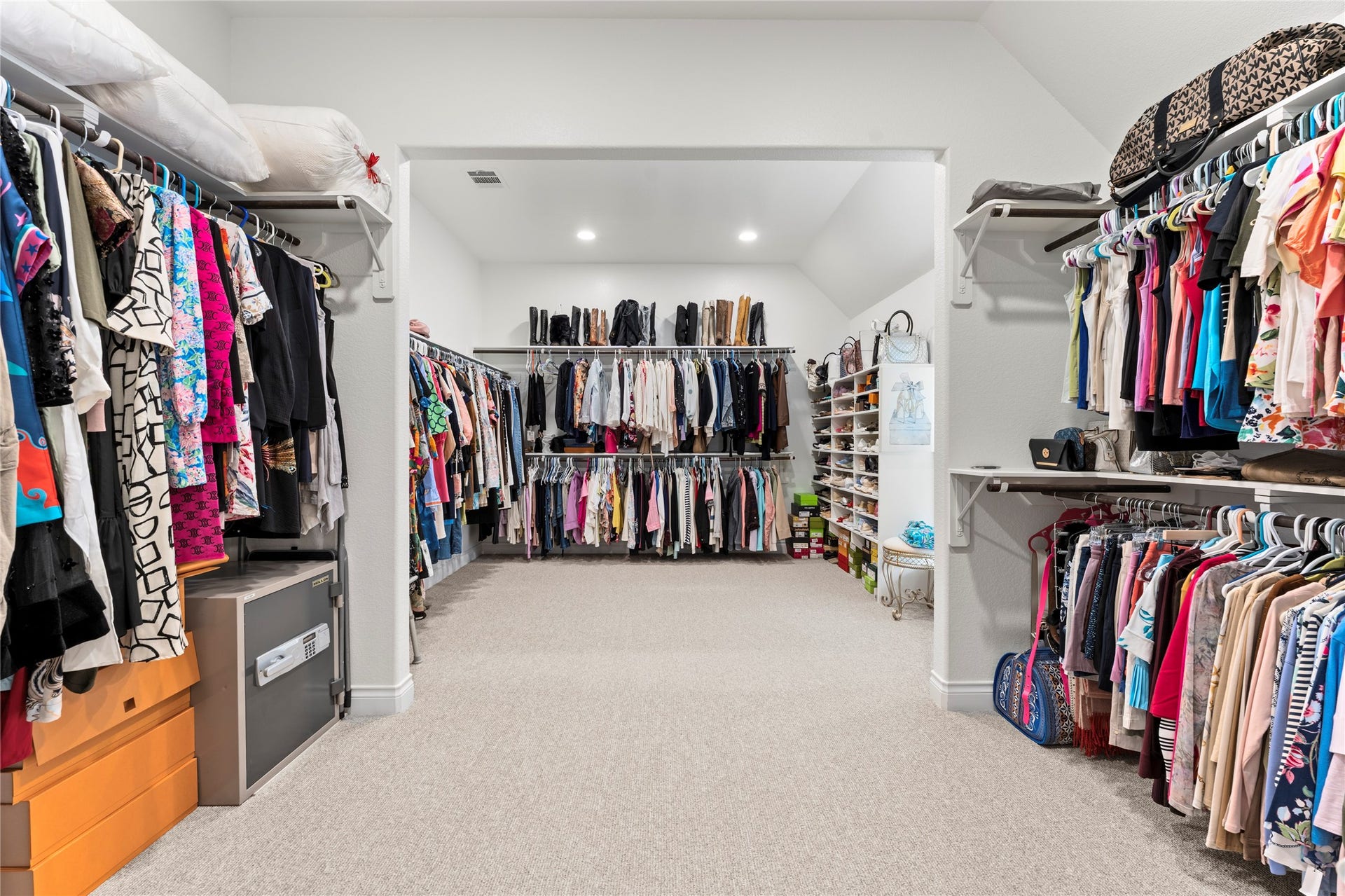 28155 Briarwood Pass, Spring, TX 77386 Enhanced beautiful master walk-in closet expanded for more spacious and elegant experience, with plenty of light.
