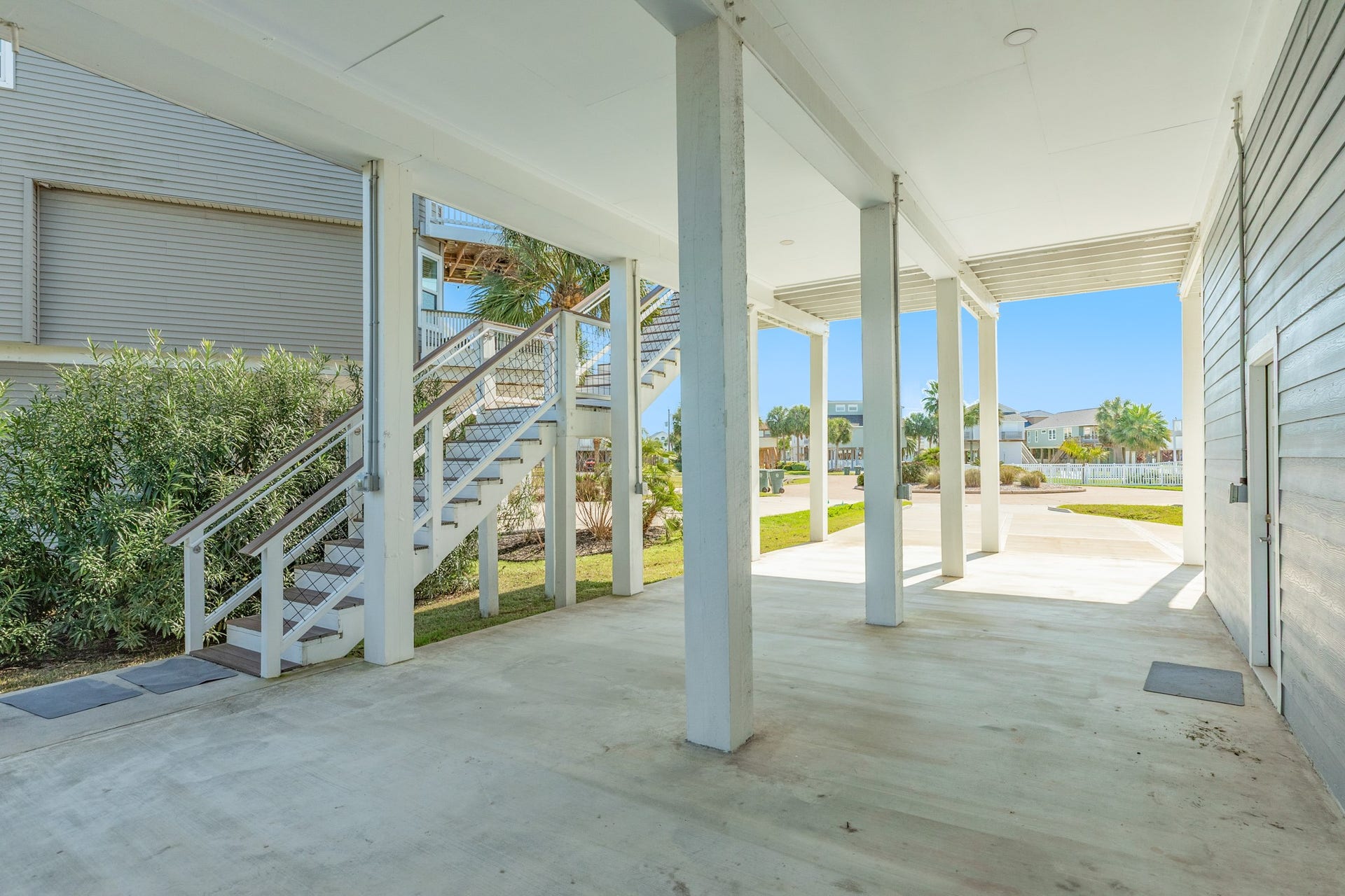 3903 Pirates Beach Blvd Court, Galveston, TX 77554 Staircase leading up onto main deck and front entrance.