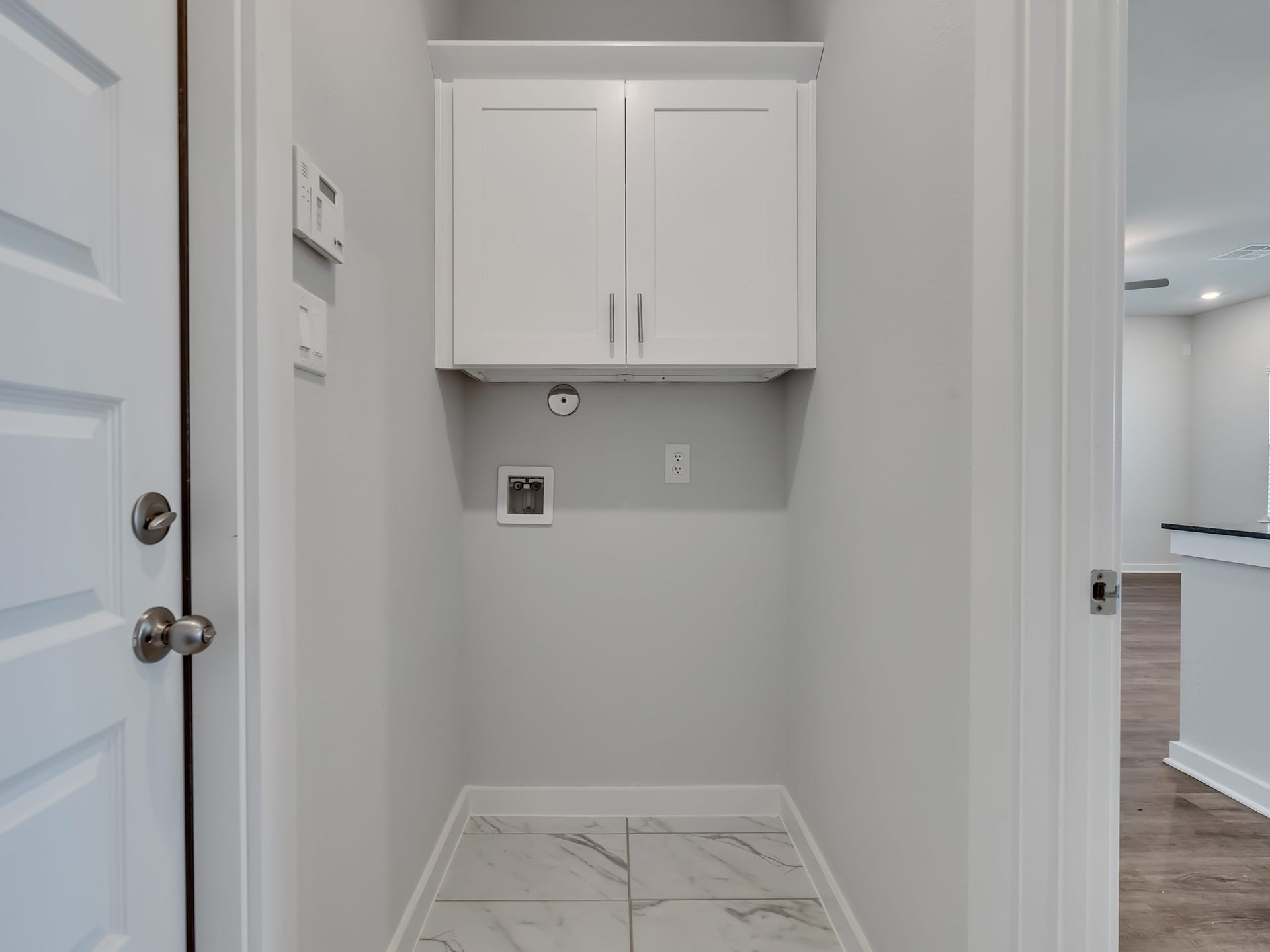 1206 Elsinore Drive, Rosharon, TX 77583 In-home laundry room. Washer and dryer have been installed for your convenience.