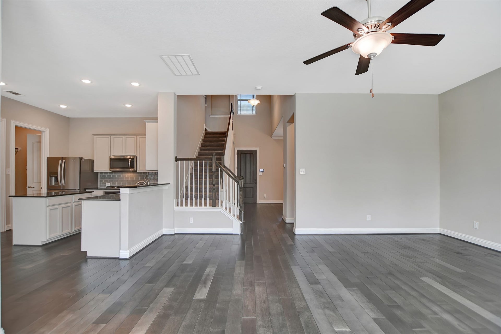 Open Floor plan,with the Family Room and the Kitchen side by side.
