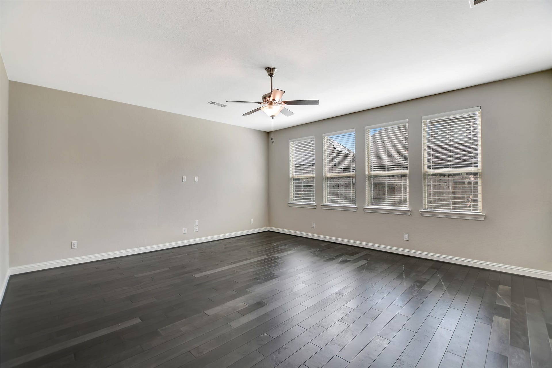 Large Family Room with lots of natural Light.