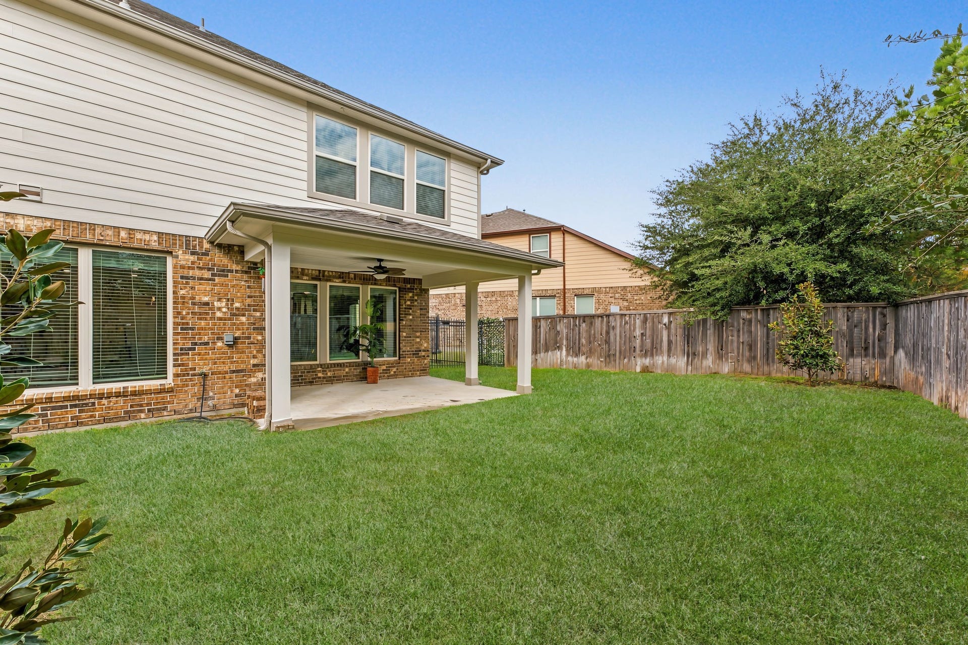 16 Centennial Ridge Place, The Woodlands, TX 77354 Relax after a long day or enjoy a morning cup of coffee on the patio.