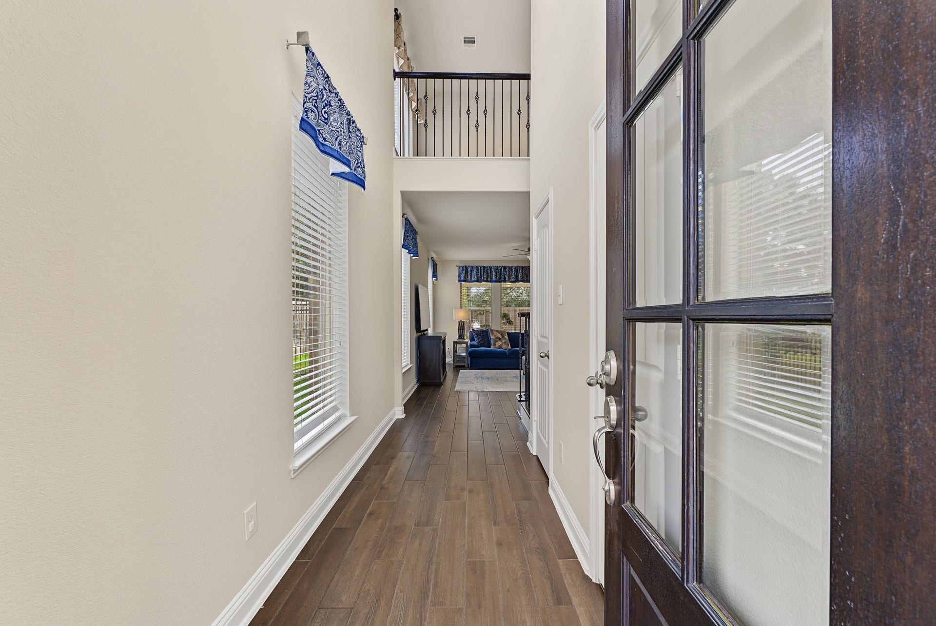 16 Centennial Ridge Place, The Woodlands, TX 77354 The beautiful wood look tile floors are durable and timeless.