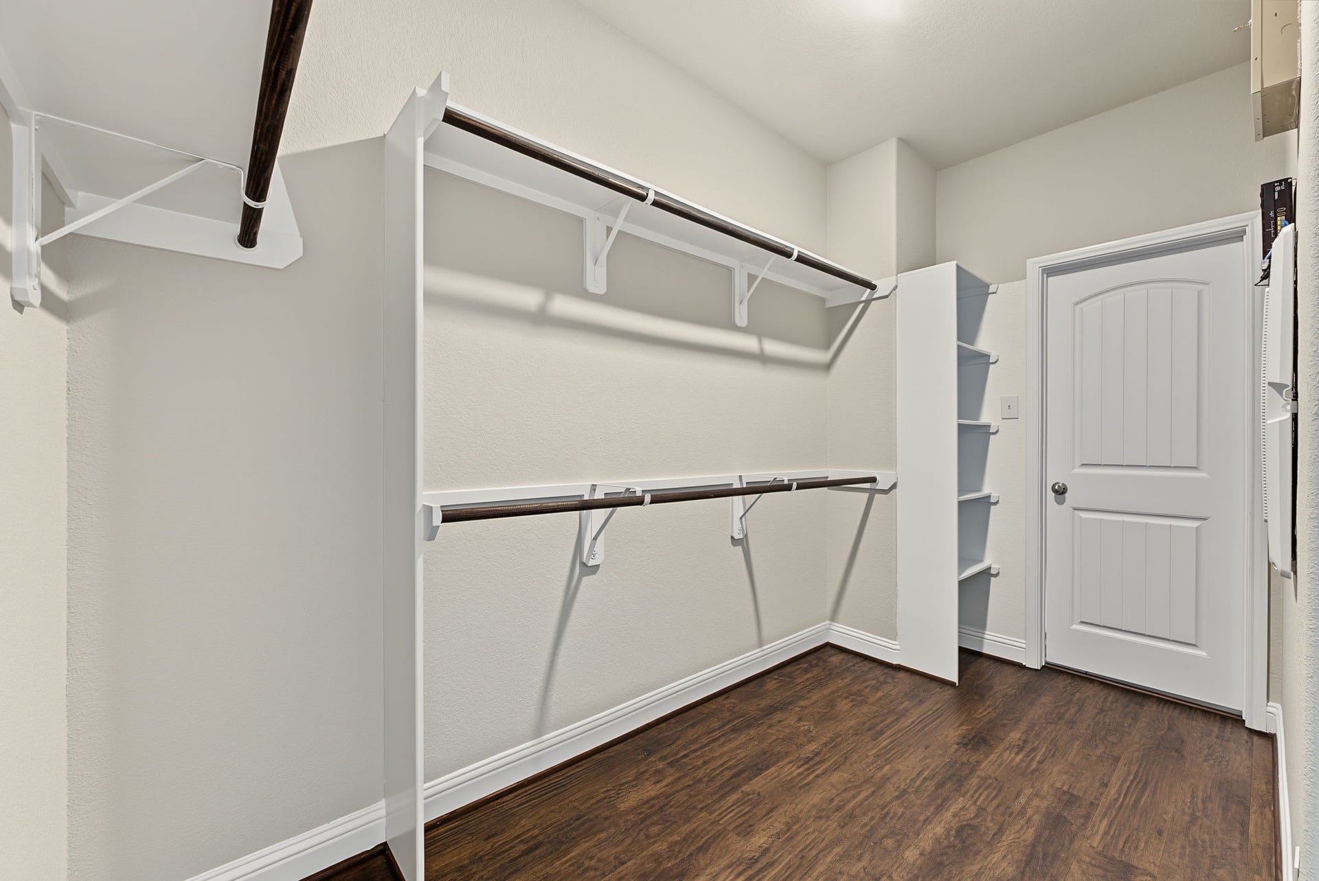 16 Centennial Ridge Place, The Woodlands, TX 77354 The primary closet just off the bathroom connects directly to the laundry room.