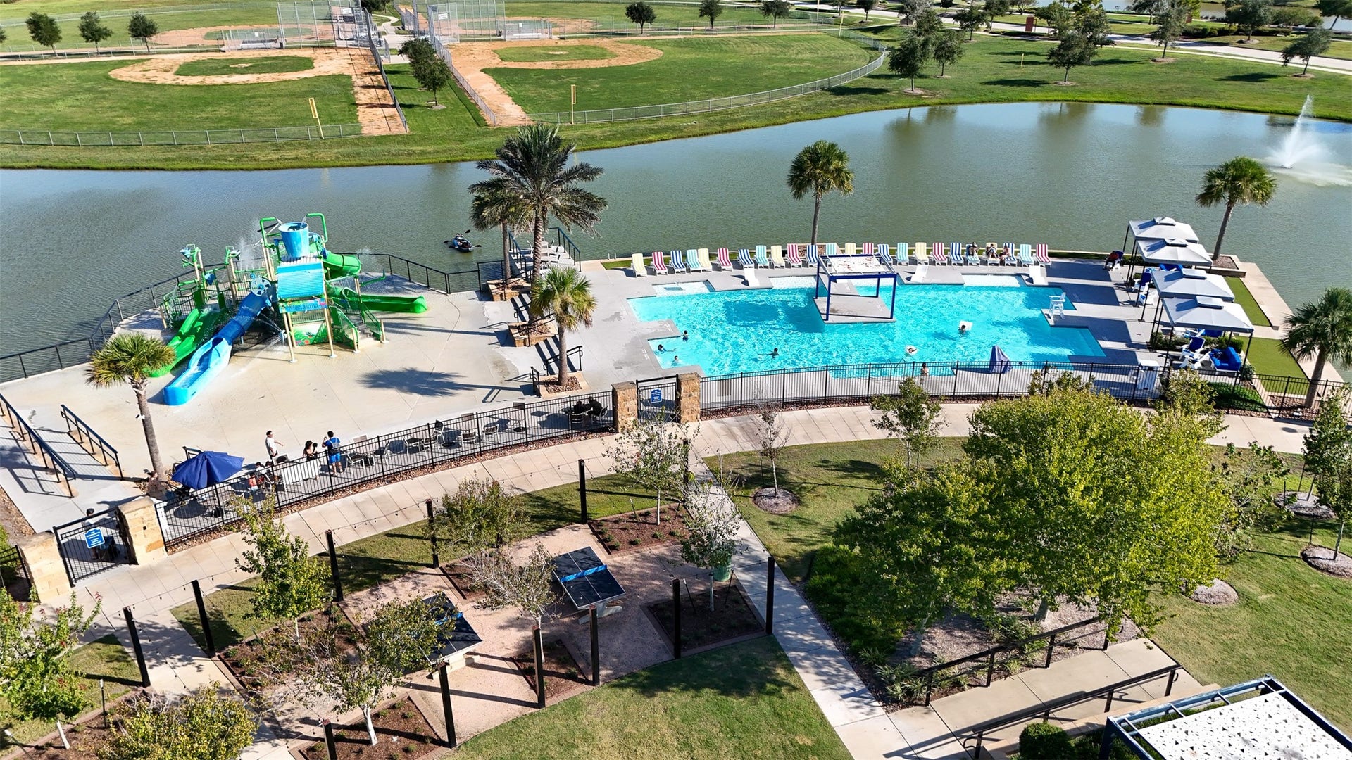 3707 Amoroso Drive, Iowa Colony, TX 77583 From pool time to ballgames, this bird's-eye view captures lots of fun ways to enjoy a day in Meridiana.